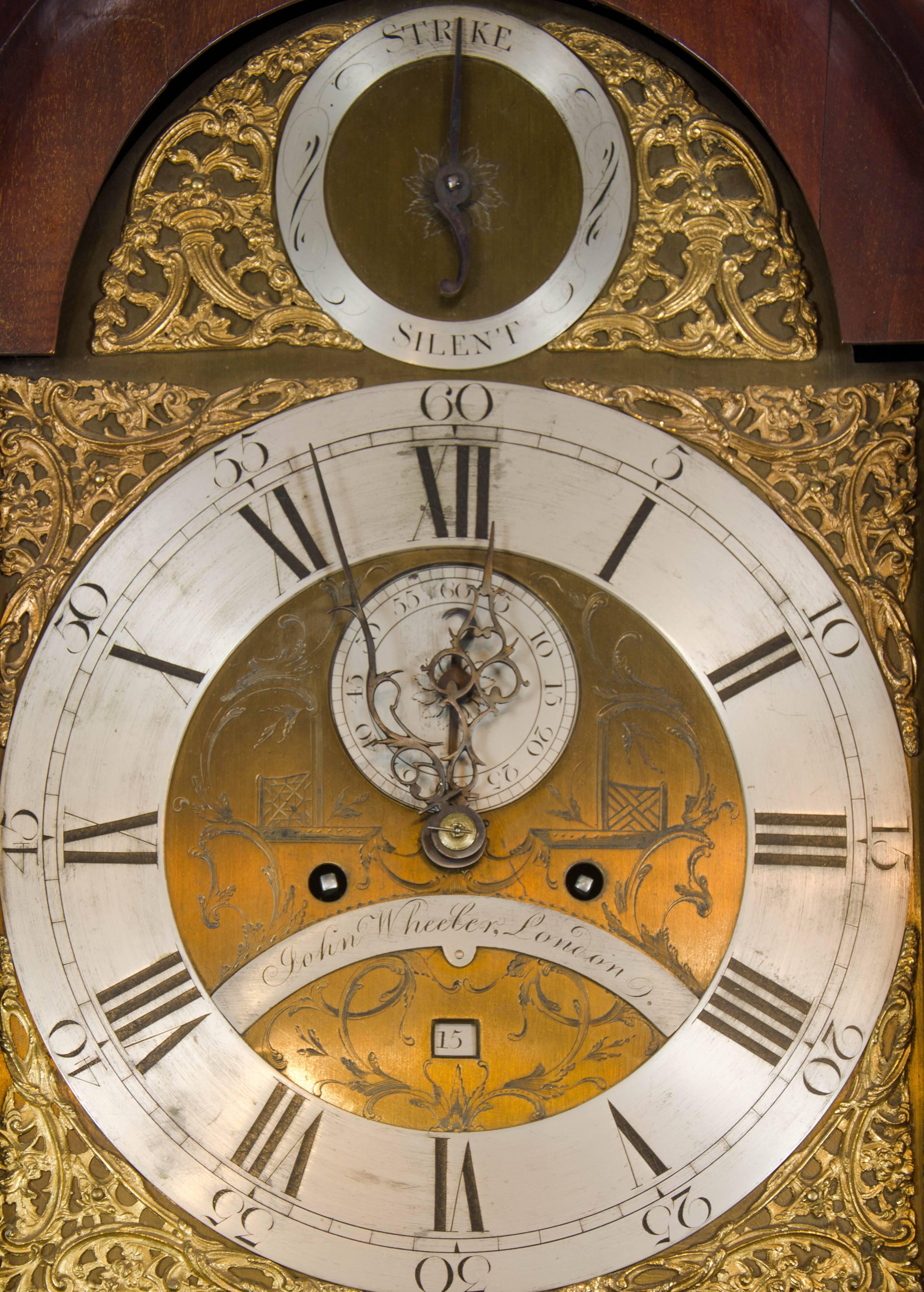 George III 18th Century mahogany long case clock; silvered chapter ring and gilt astragals