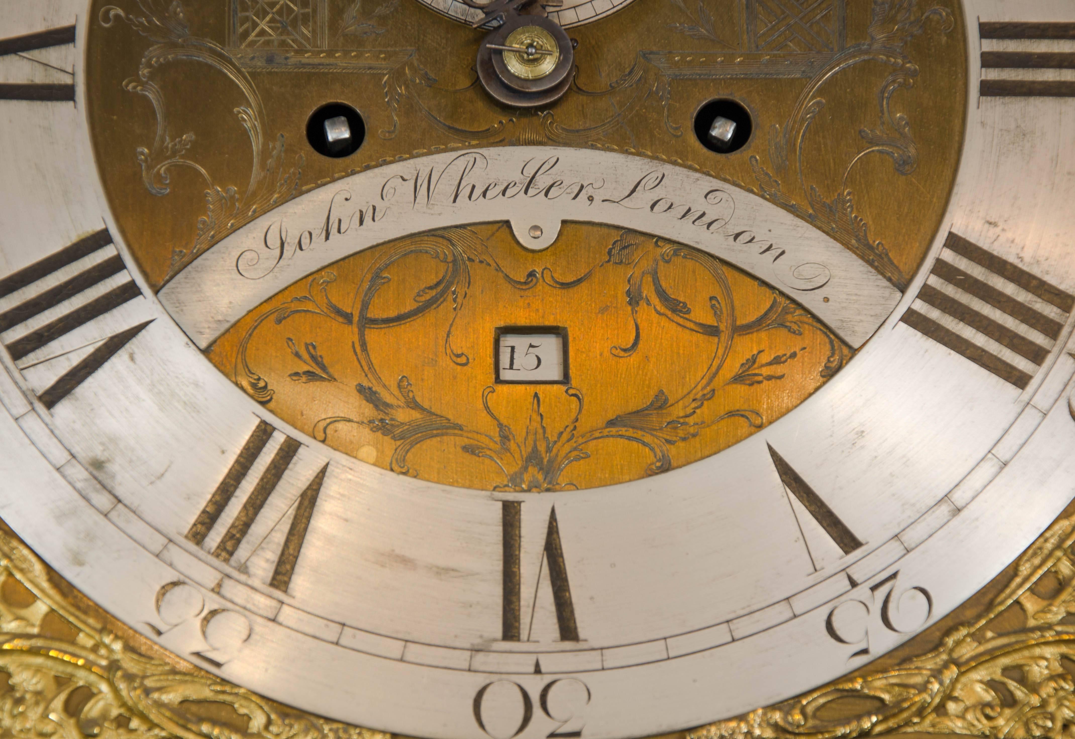 English 18th Century mahogany long case clock; silvered chapter ring and gilt astragals