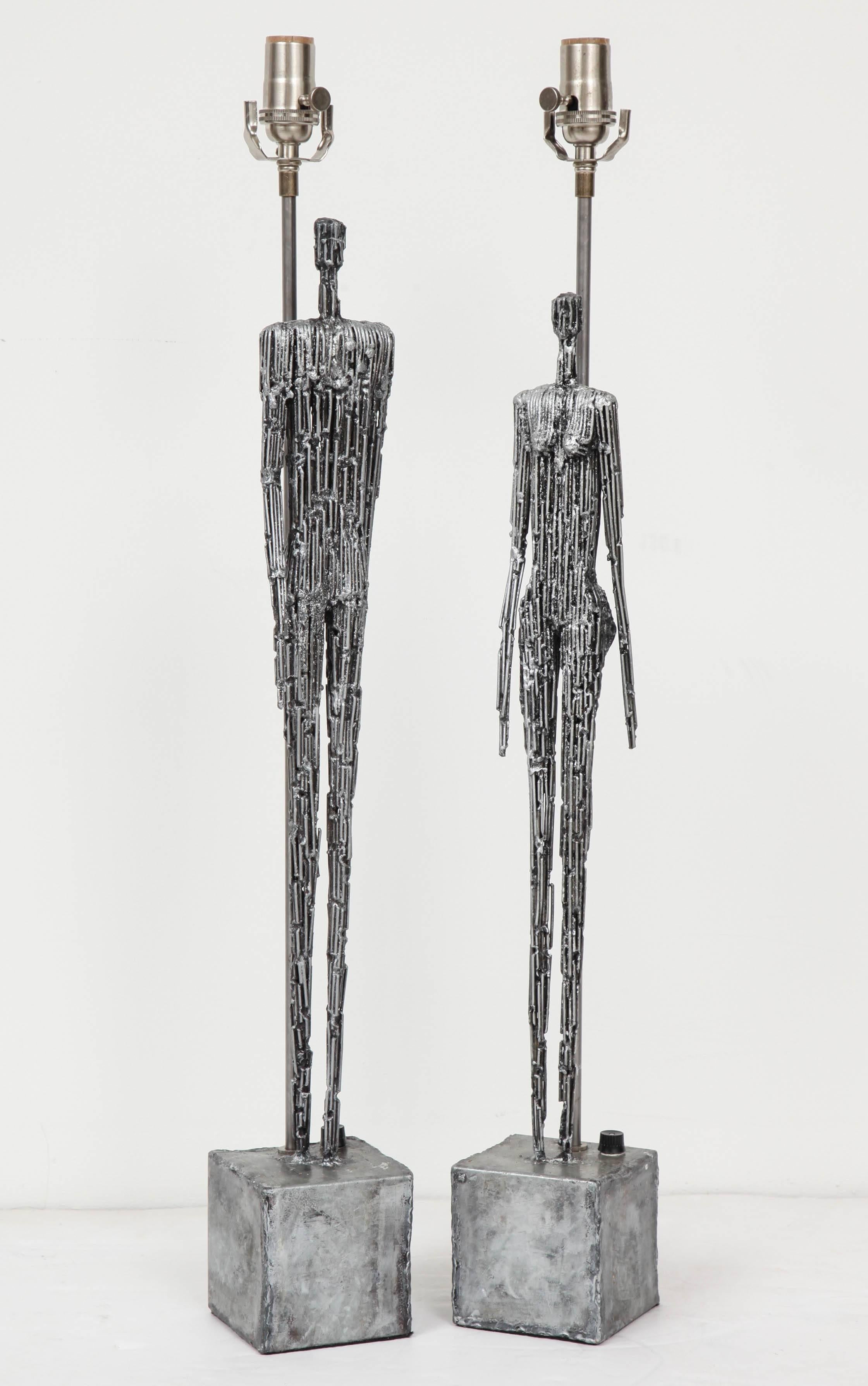 Decorative pair of lamps of a couple, C 1950. Lamps are made of nails and plated in nickel.