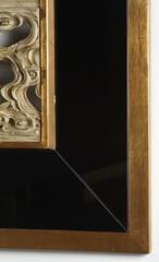 Magnifique sculpture orientale encadrée dans un miroir noir et bois doré