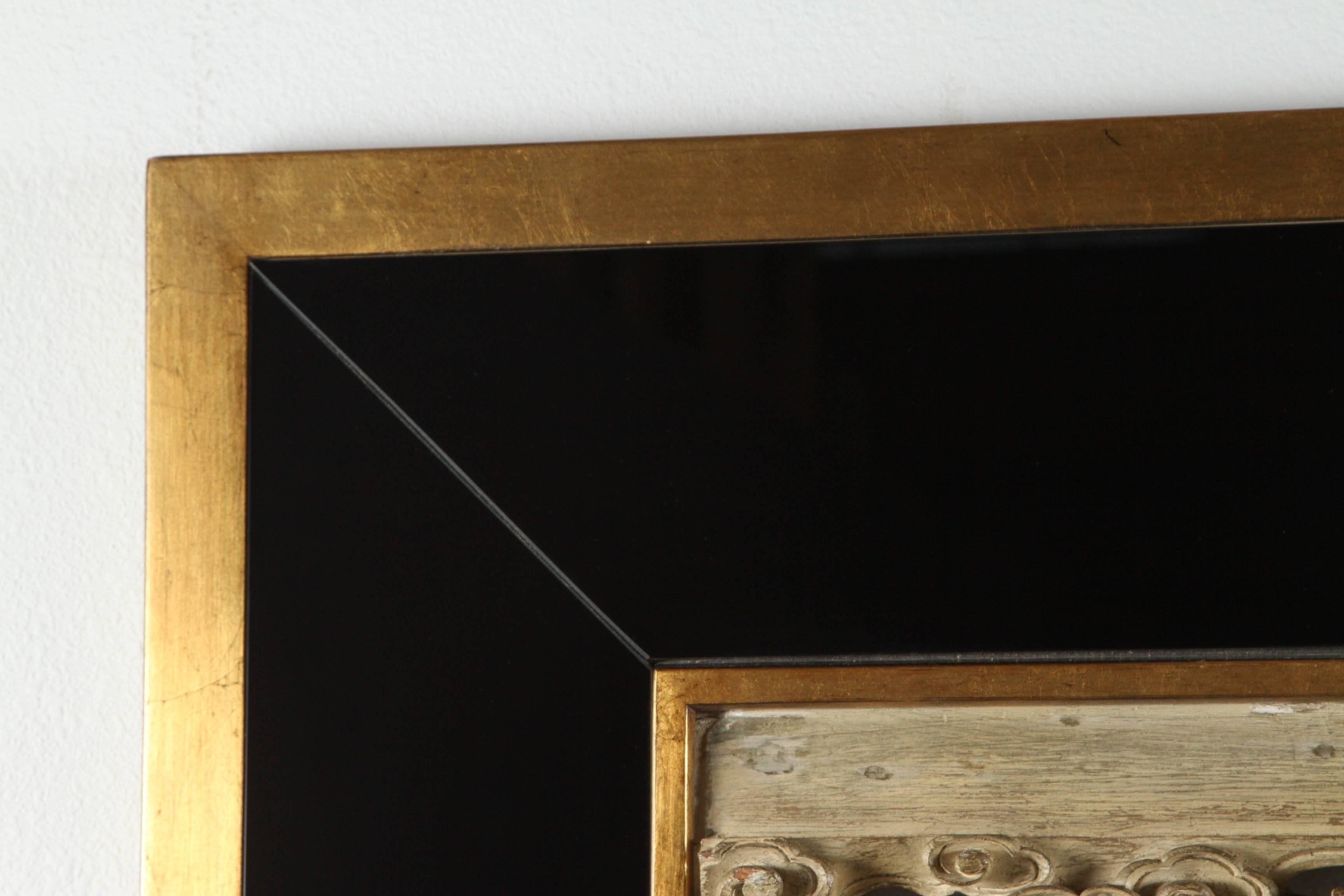 Mid-20th Century Beautiful Oriental Carving Framed in Black Mirror and Gilded Wood For Sale