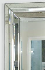 Grand Mirror with a Faceted Mirrored Frame