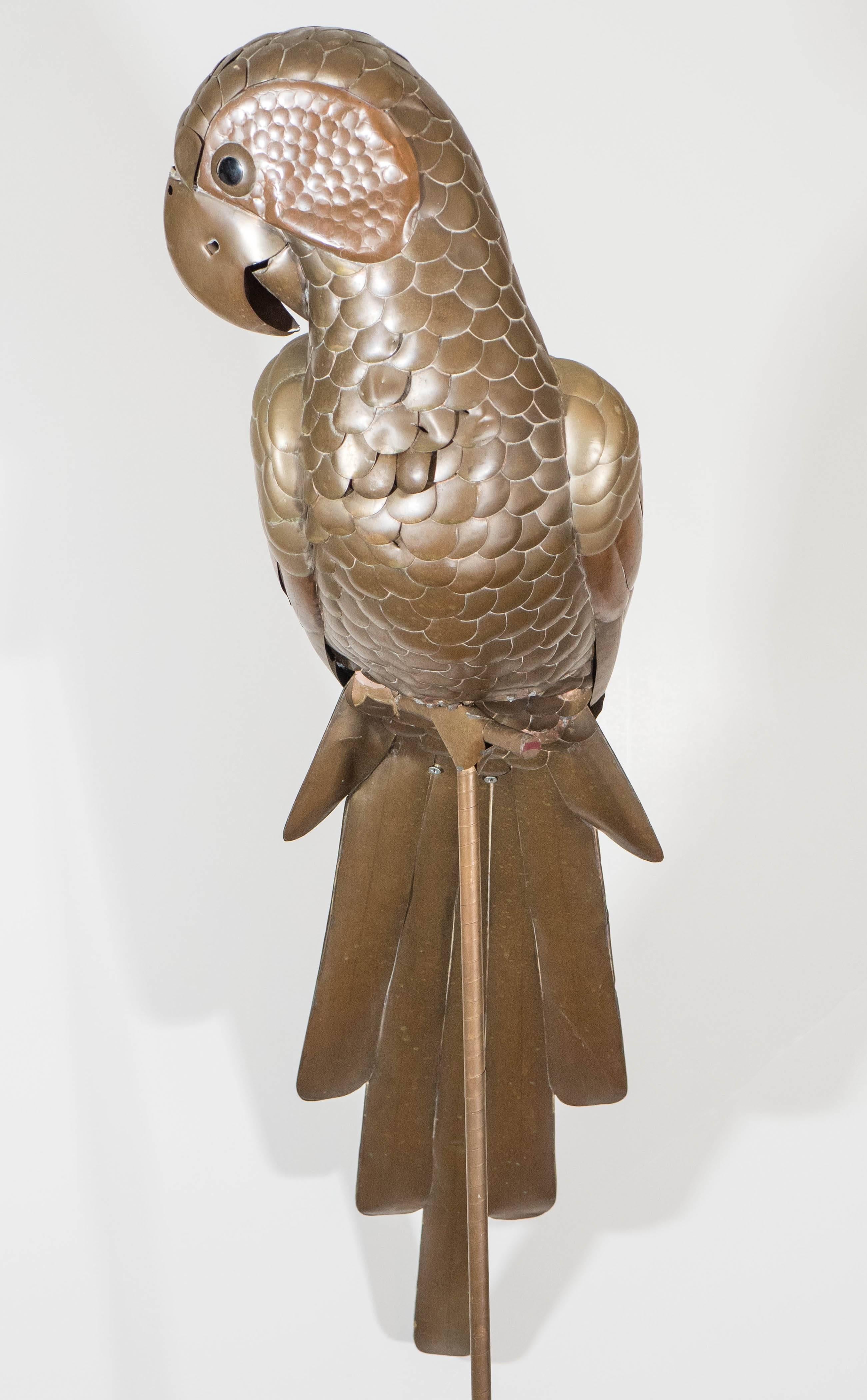 brass parrot on stand