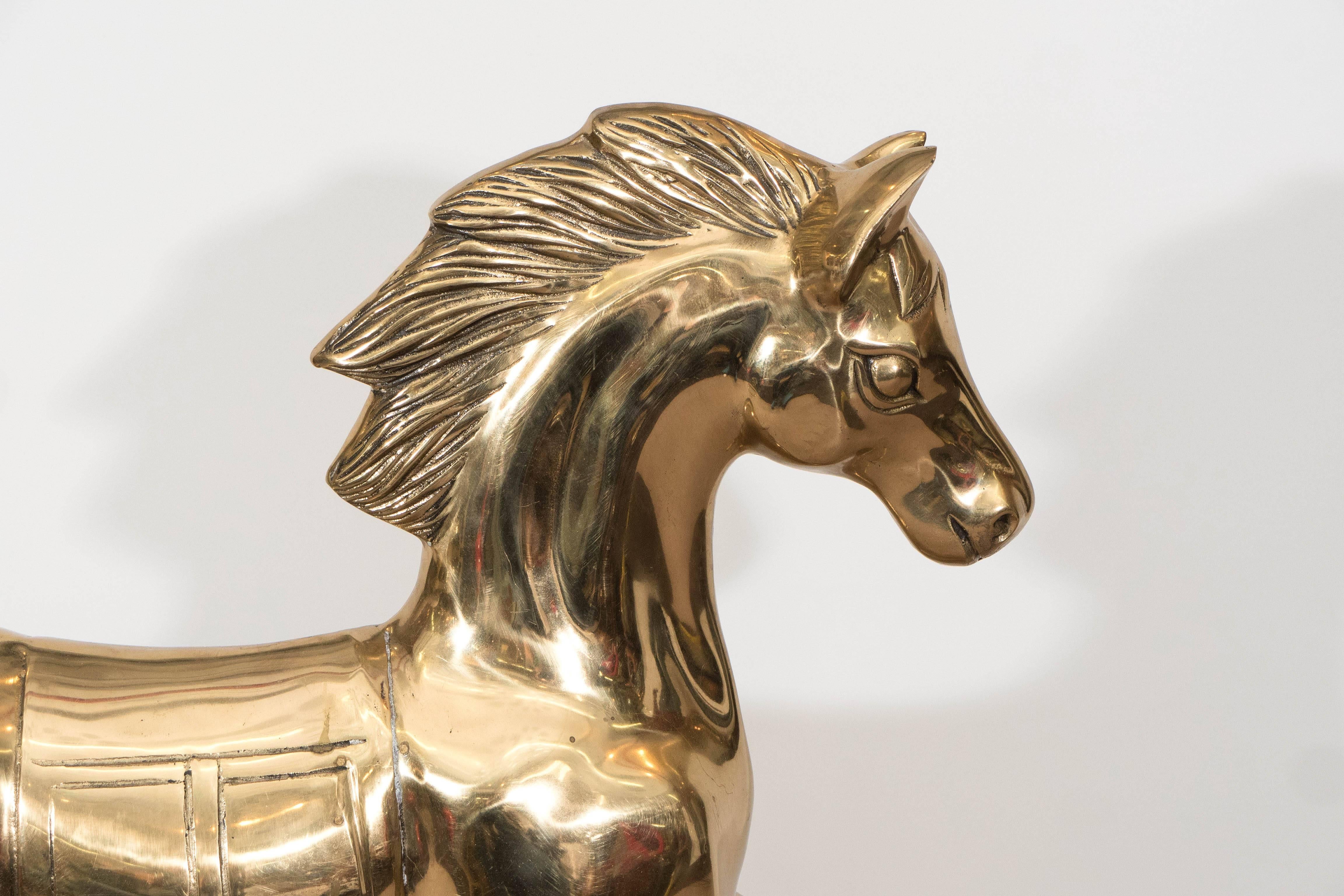 This vintage rocking horse in detailed polished brass, is in very good condition, with some minor pitting and patina, consistent with age and use.
