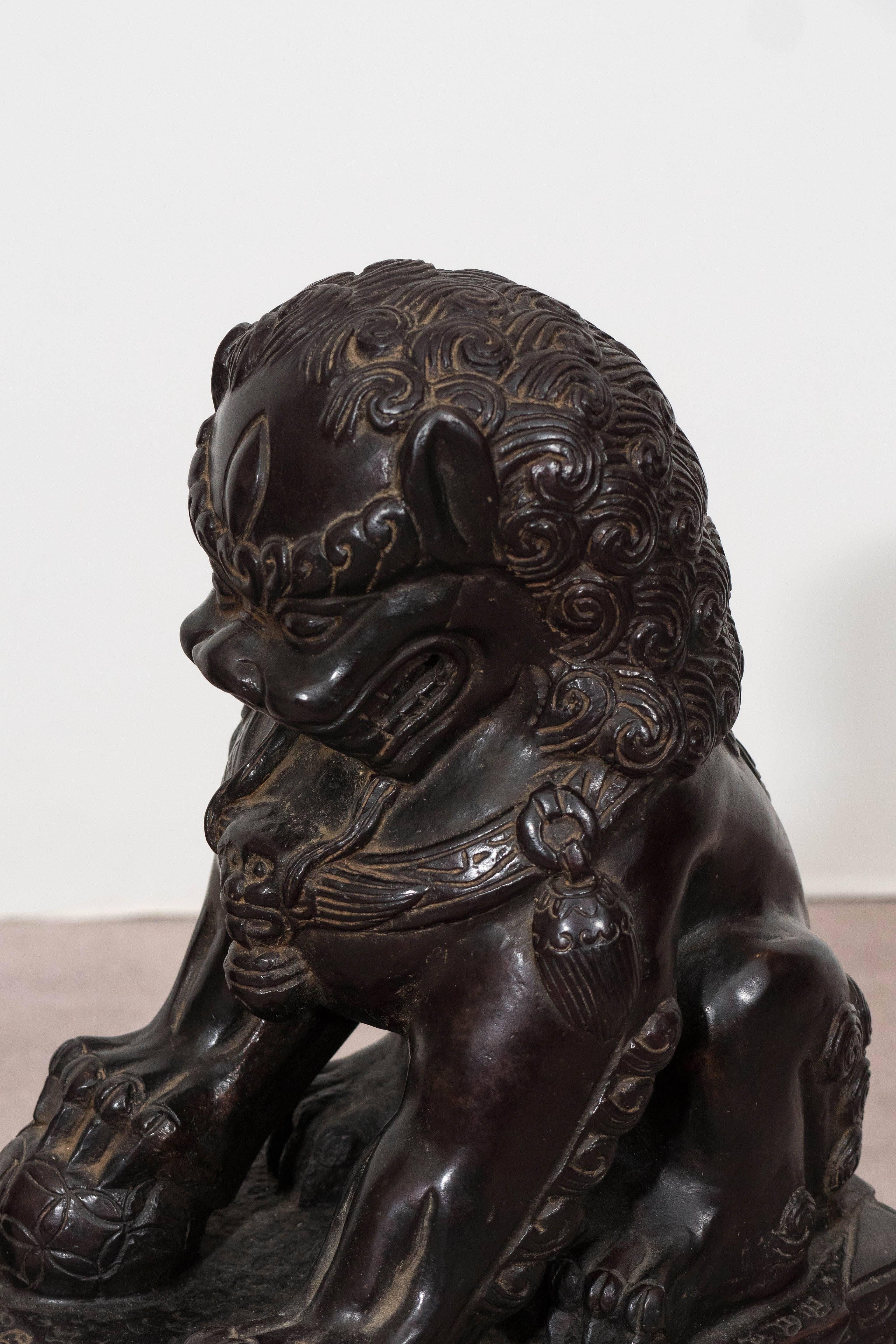 Pair of Chinese Foo Dogs on Pedestals in Bronze 1