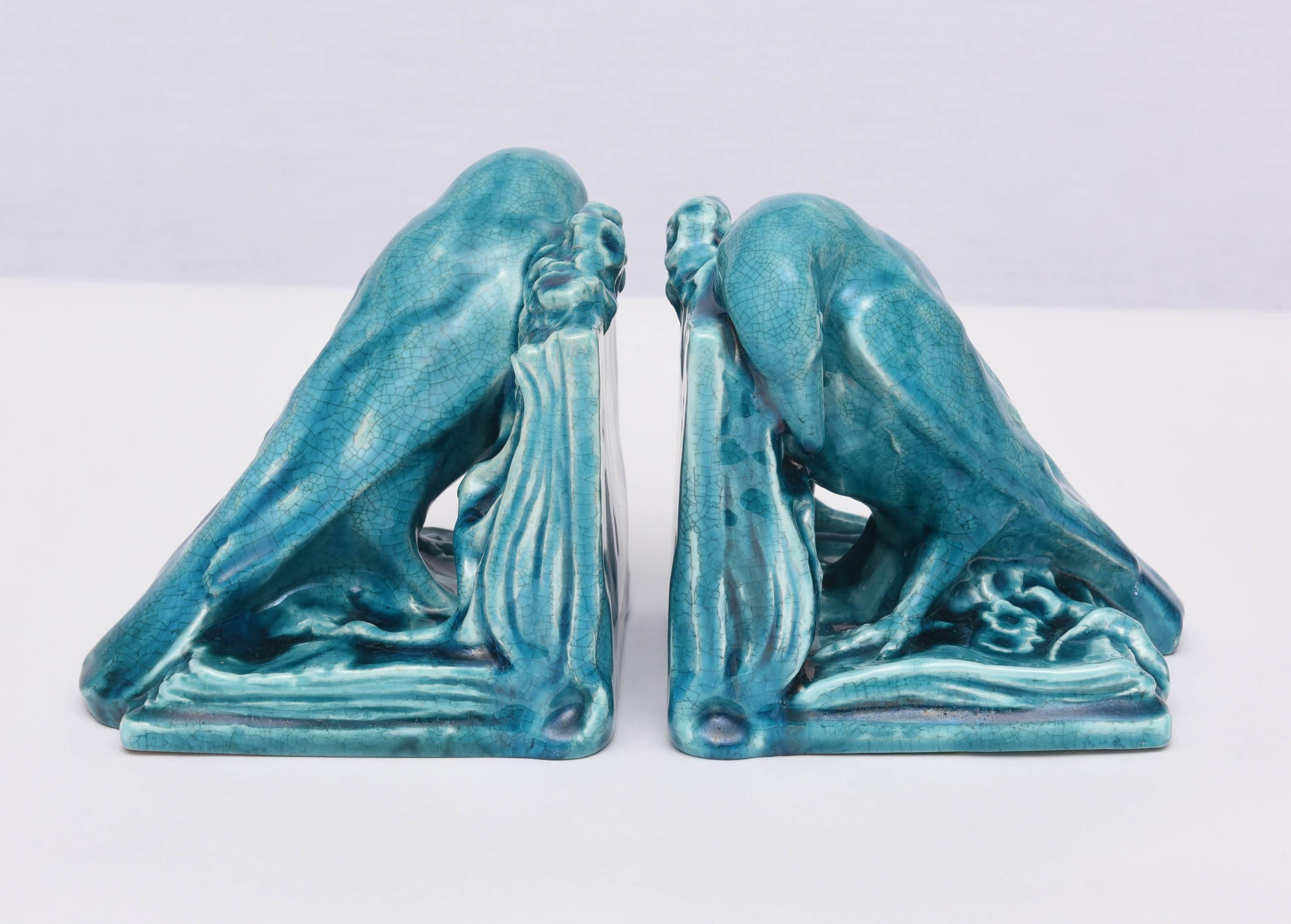 Beautiful and rare ceramic Rookwood Raven bookends, mid-1940s, USA. Turquoise crackle glaze.