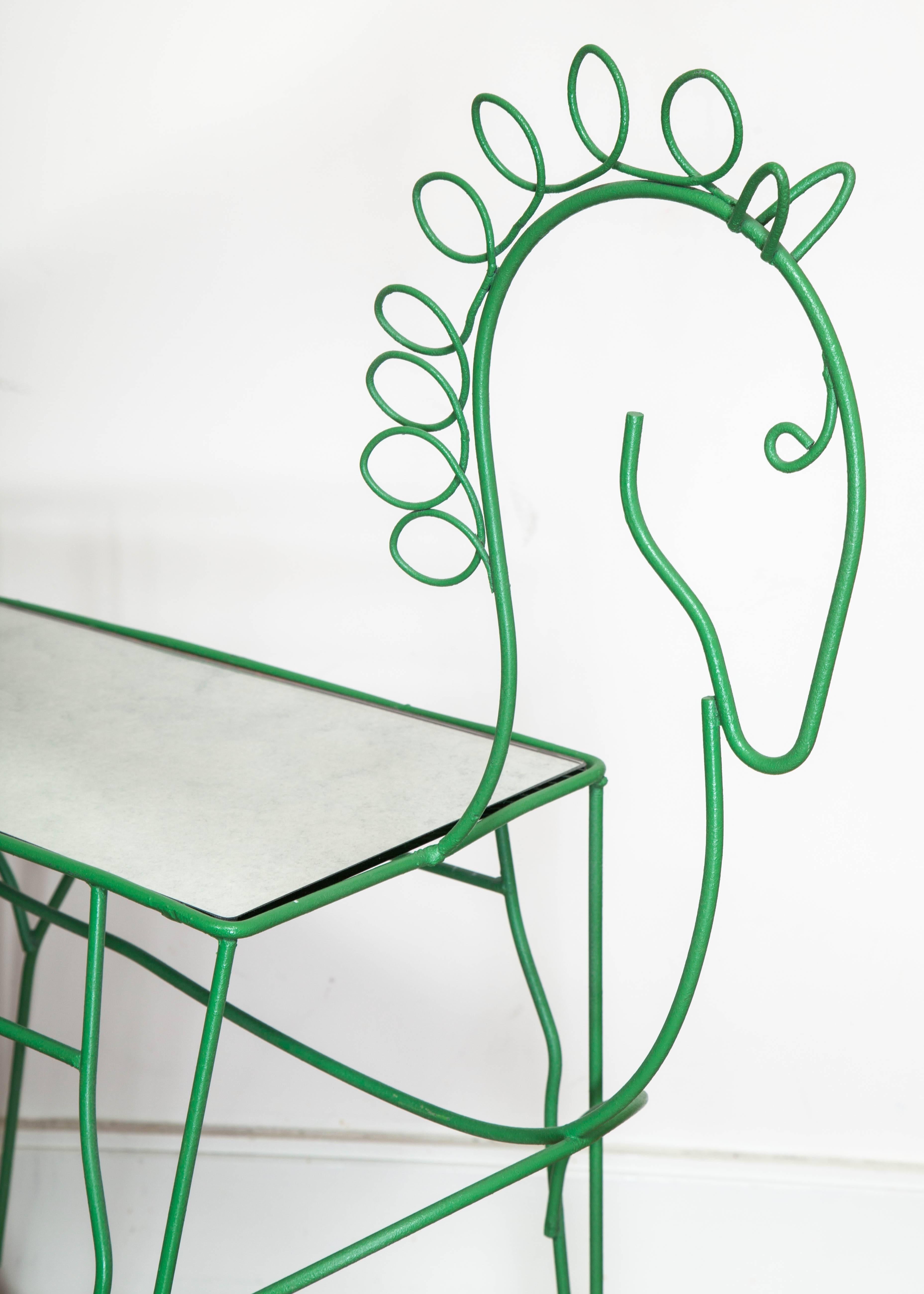 1960s wirework bar cart in the form of a horse in the style of John Risley and Frederick Weinberg. Painted green with mirror top, on castors. 