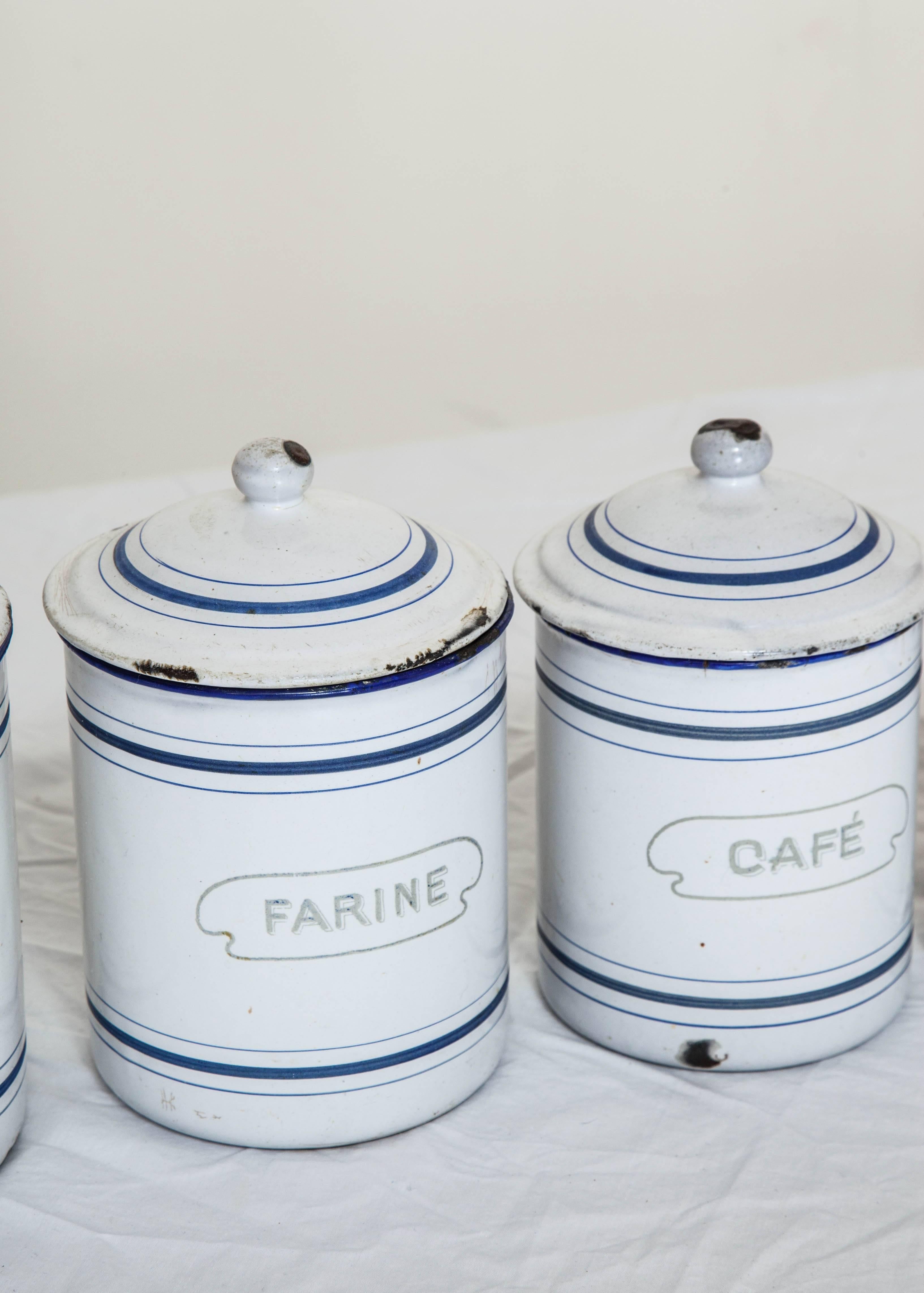 Six-Piece Antique French Pantry Tin Canisters In Distressed Condition In Chicago, IL
