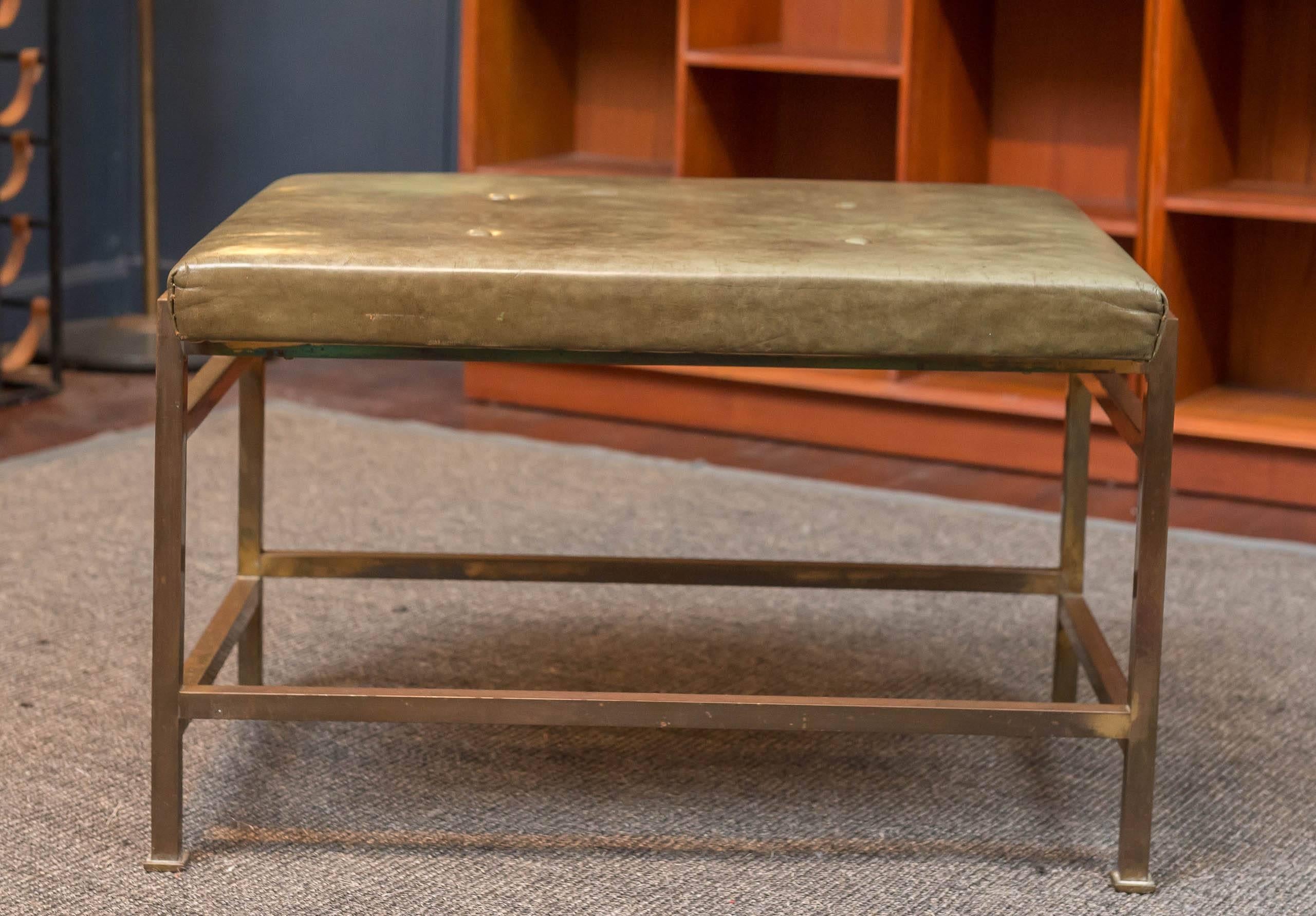 Edward Wormley design brass bench for Dunbar, Berne Indiana. 
Very good original condition with original olive leather upholstery and brass manufacturer's  badge.