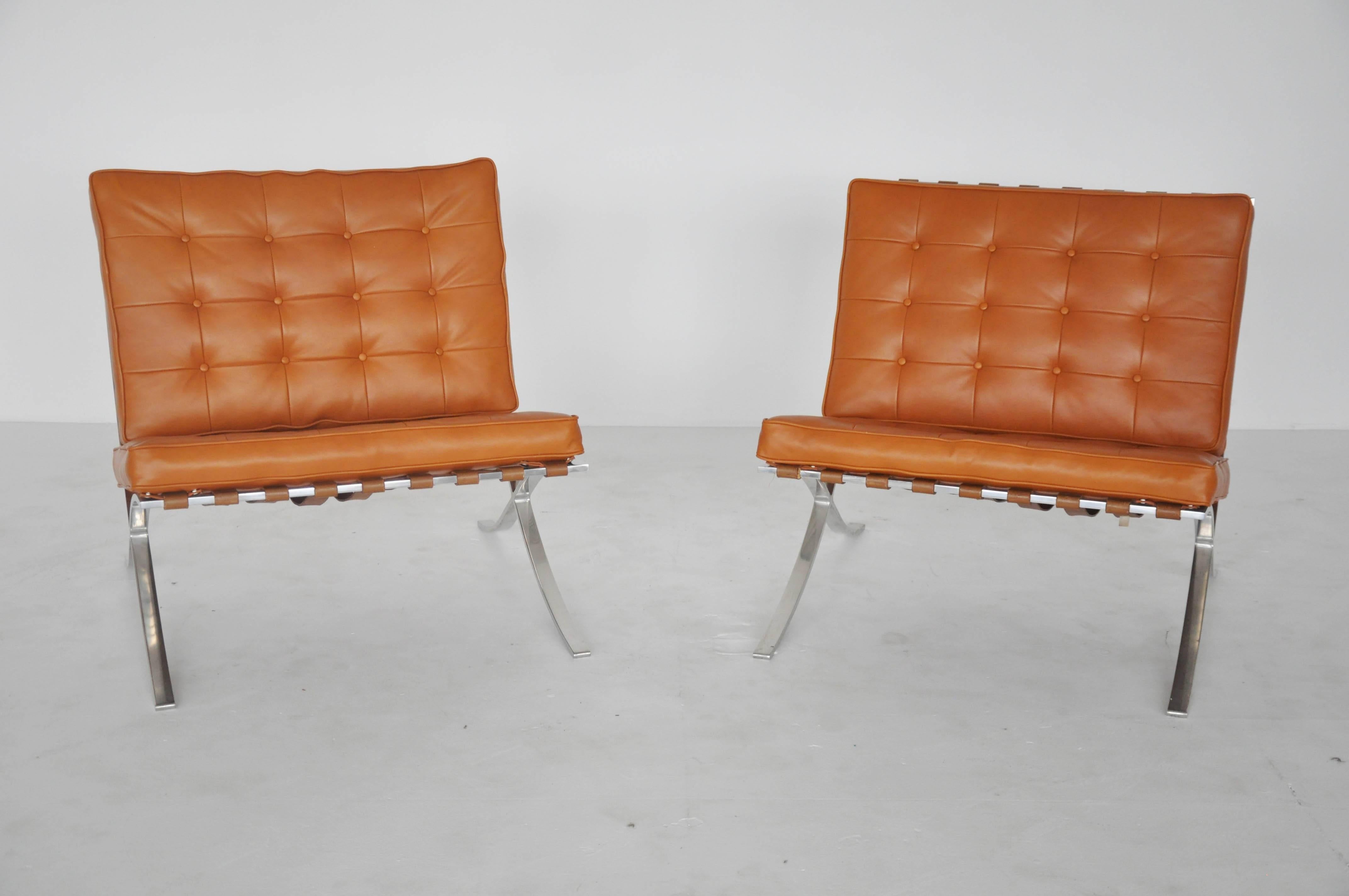 Ludwig Mies van der Rohe Barcelona chairs. Manufactured by Knoll, with labels. Early model circa 1960s with newer leather cushions.