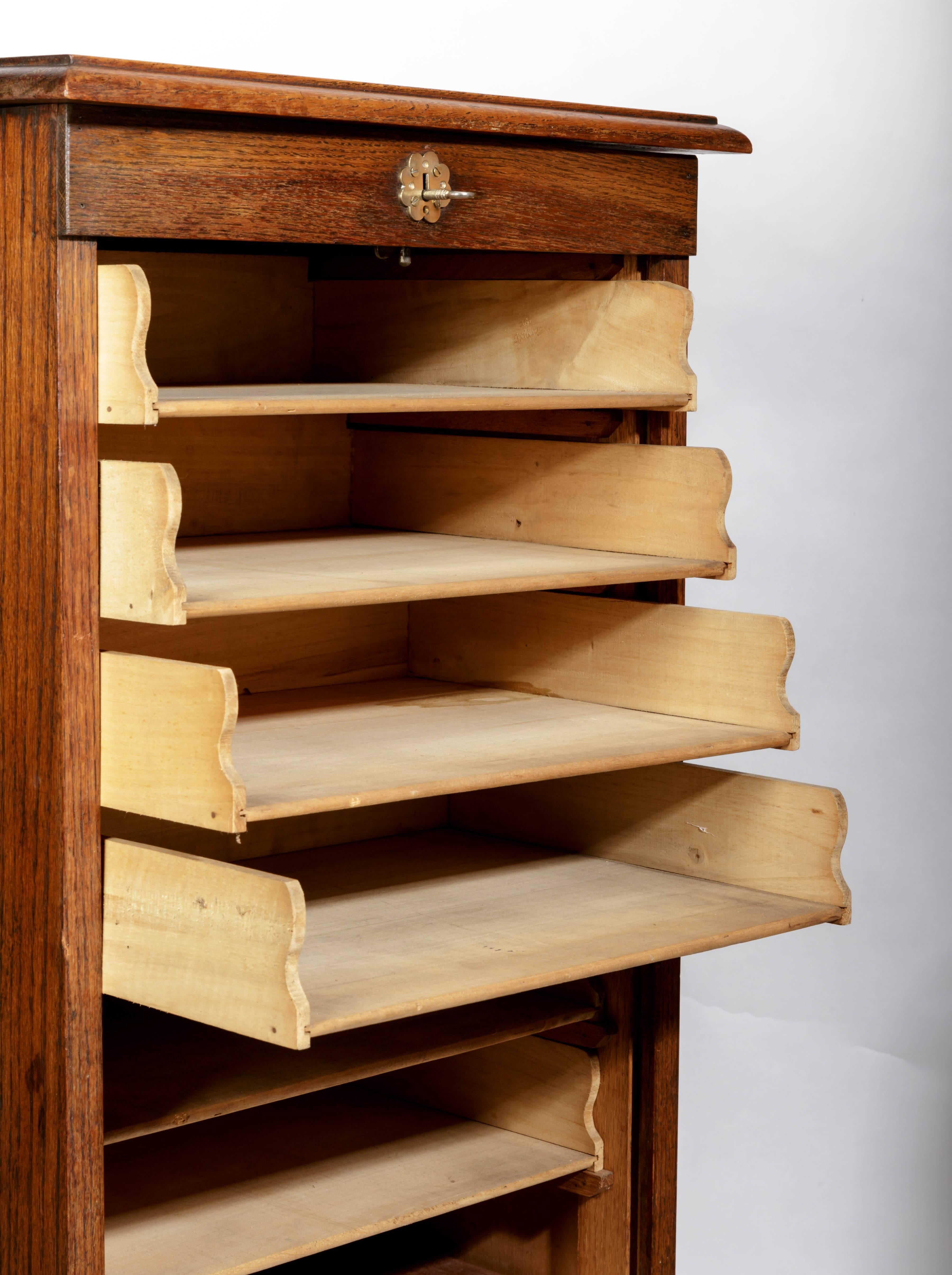 Burnished French Oak Tambour Front File Cabinet