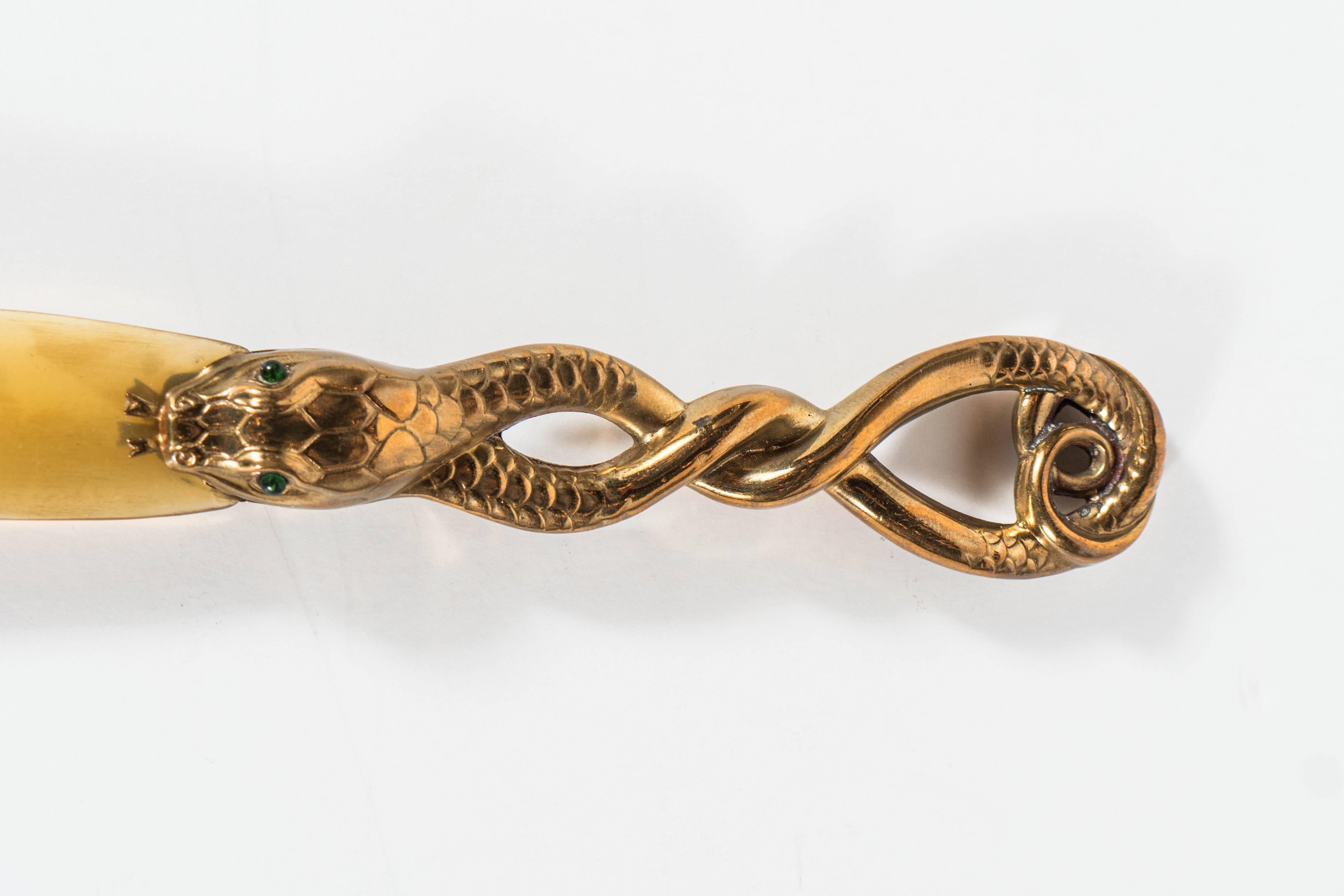 This exquisite Victorian letter opener is hand-wrought brass. lt has cabochon emerald eyes and an amber colored Horn blade. This is truly a remarkable piece that was originally purchased at James two Galleries at east Fifty Seventh Street NY, NY a