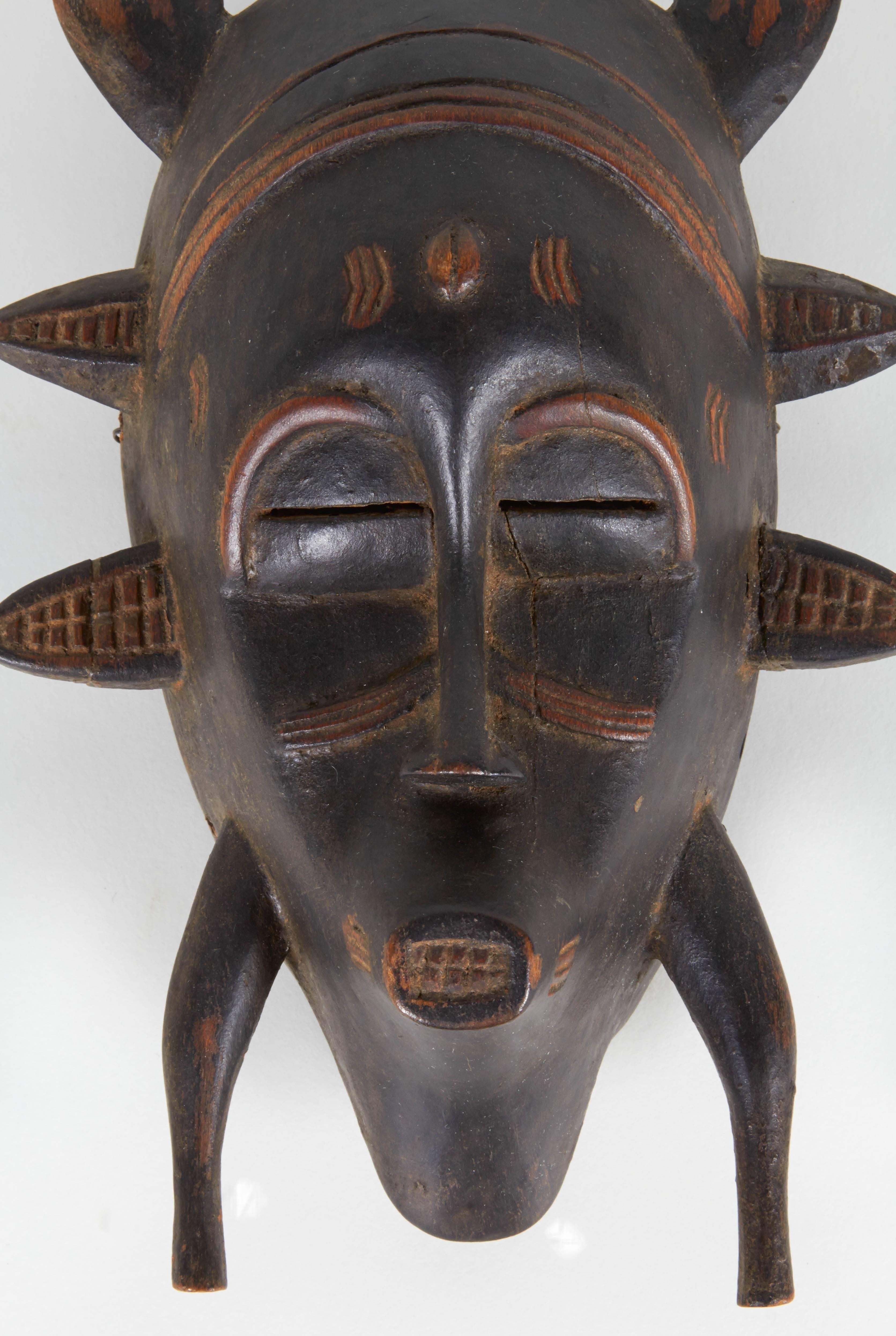This mask was selected by Tommi Parzinger for the Sylvia Hoffman collection. The mask shows definitive signs of age, but lacks signs of traditional field use. Most likely it was carved for the early tourist trade during the first half of the 20th