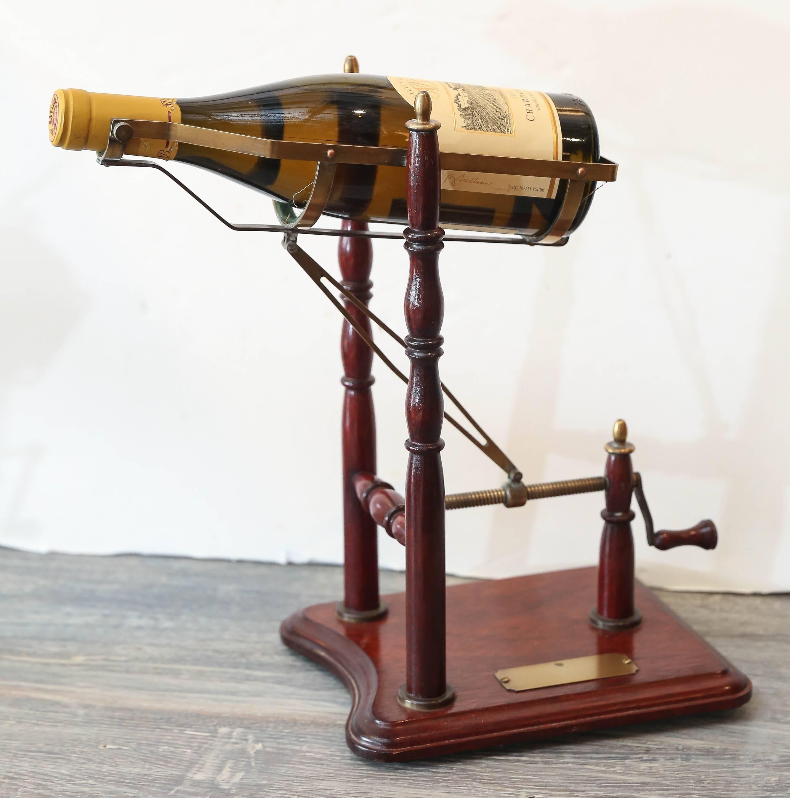 19th and 20th century mechanical wine decanters. To make sure that the sediment remained at the bottom of the bottle, these decanters help control the speed at which wine is decanted and poured. By cranking the leaver slowly the sediment remains
