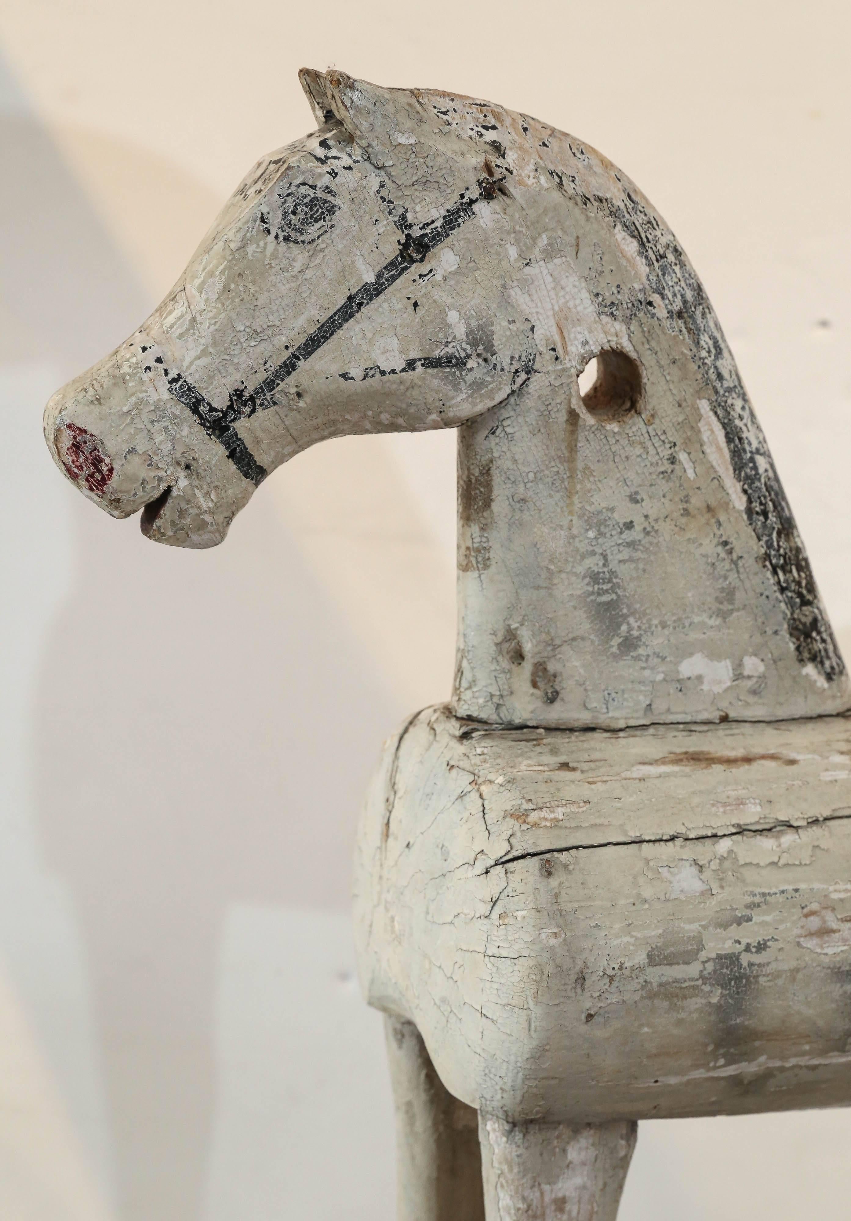 19th century Swedish child's wooden horse with original paint.