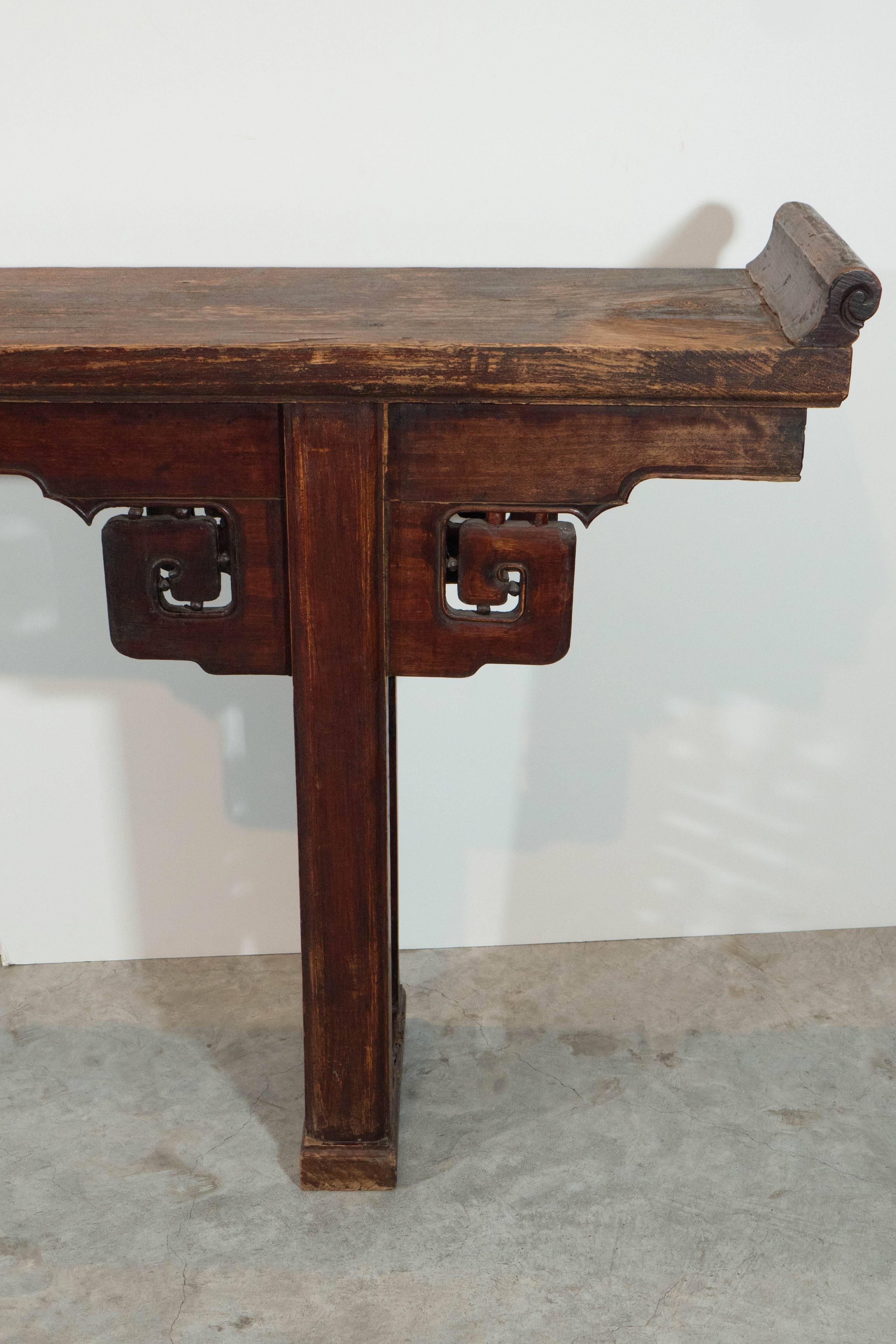 A solid antique Chinese altar table with thick elm top, beautiful patina and artfully carved legs from Shanxi Province, circa 1850.

T557.