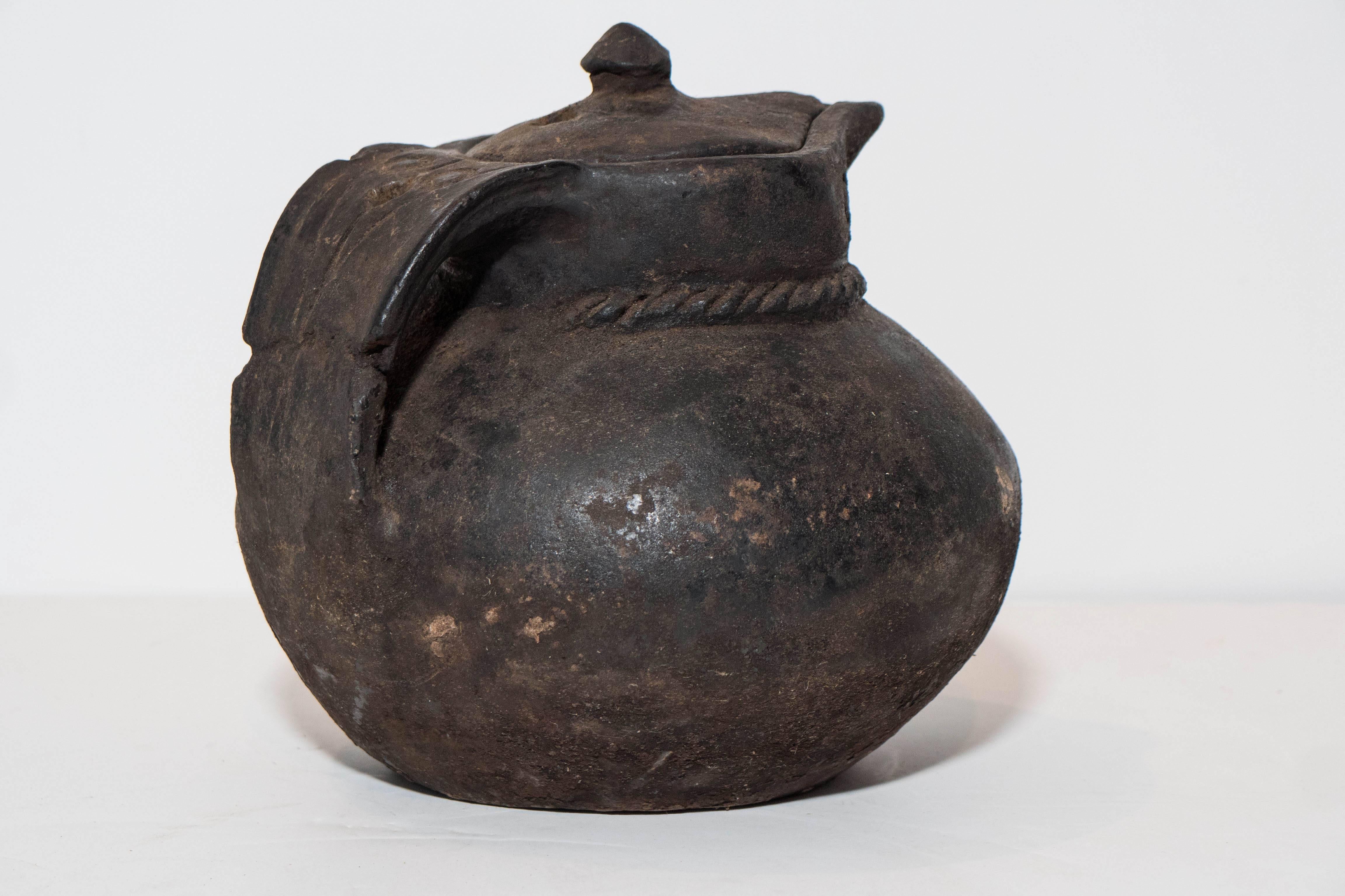 Early 20th Century Rustic Tibetan Covered Pitcher For Sale