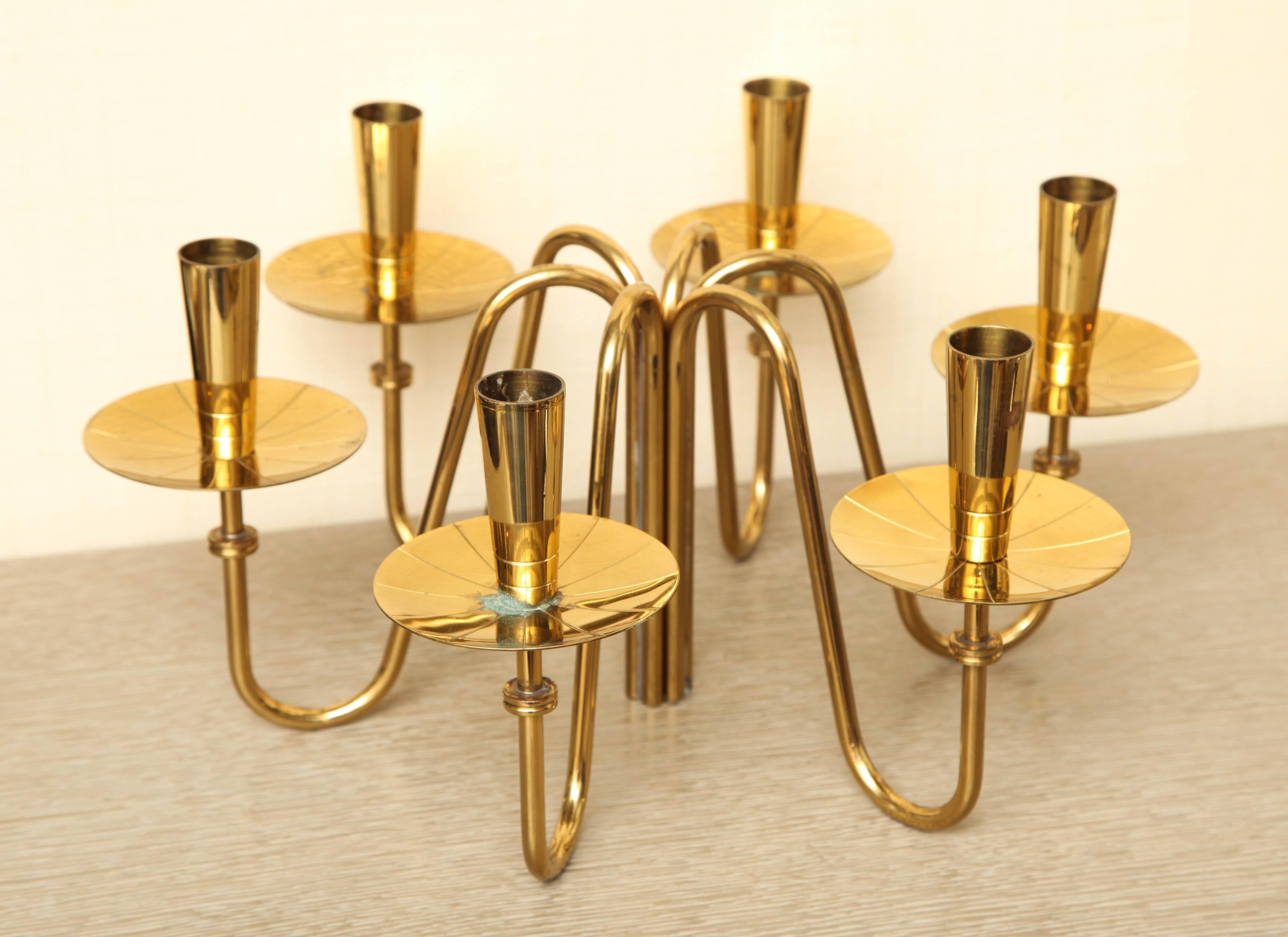Pair of dramatic brass candle holders by Tommi Parzinger, circa 1960.