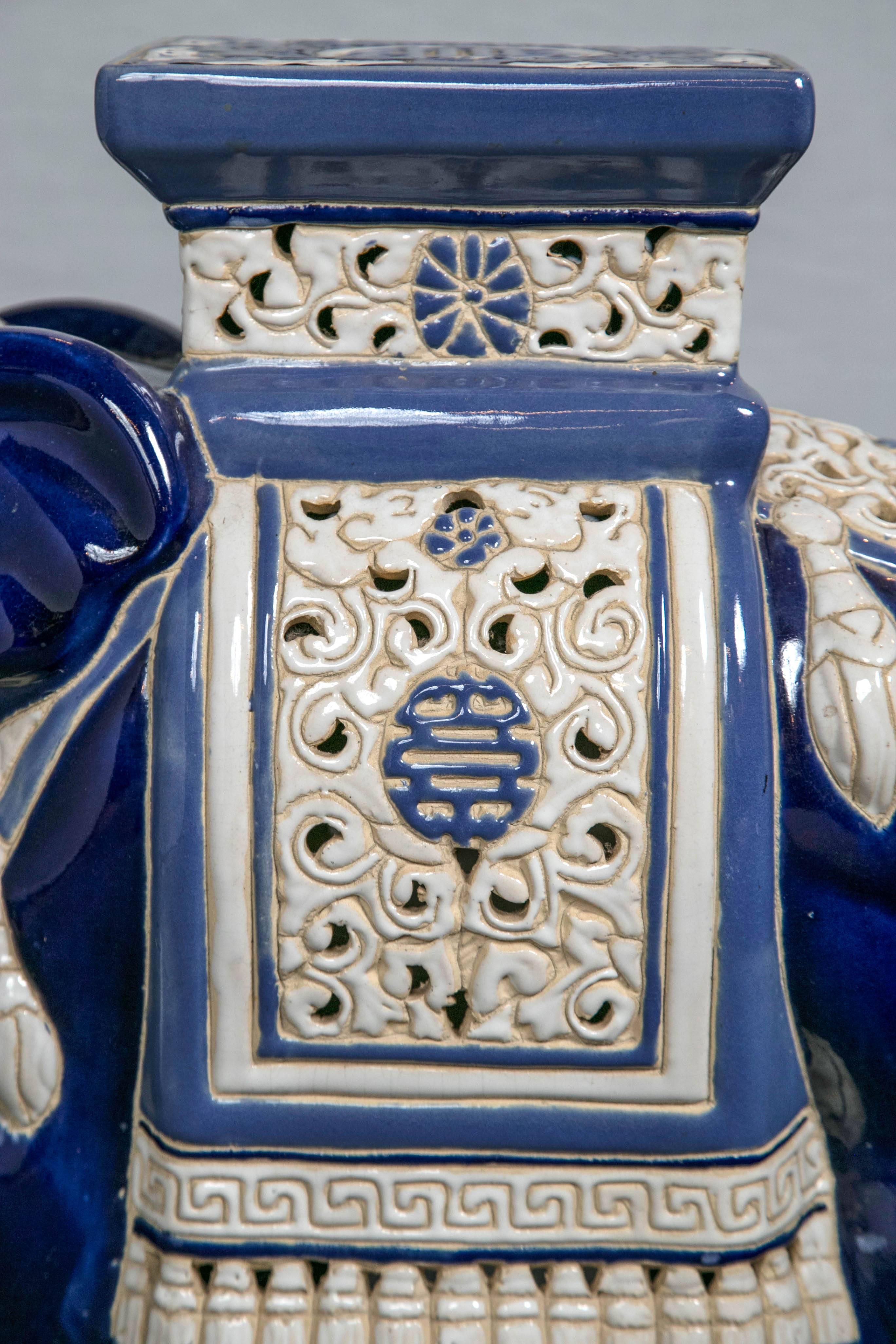 Ceramic Asian elephant garden seat, circa 1950s. Beautifully detailed with vibrant blue glazes.