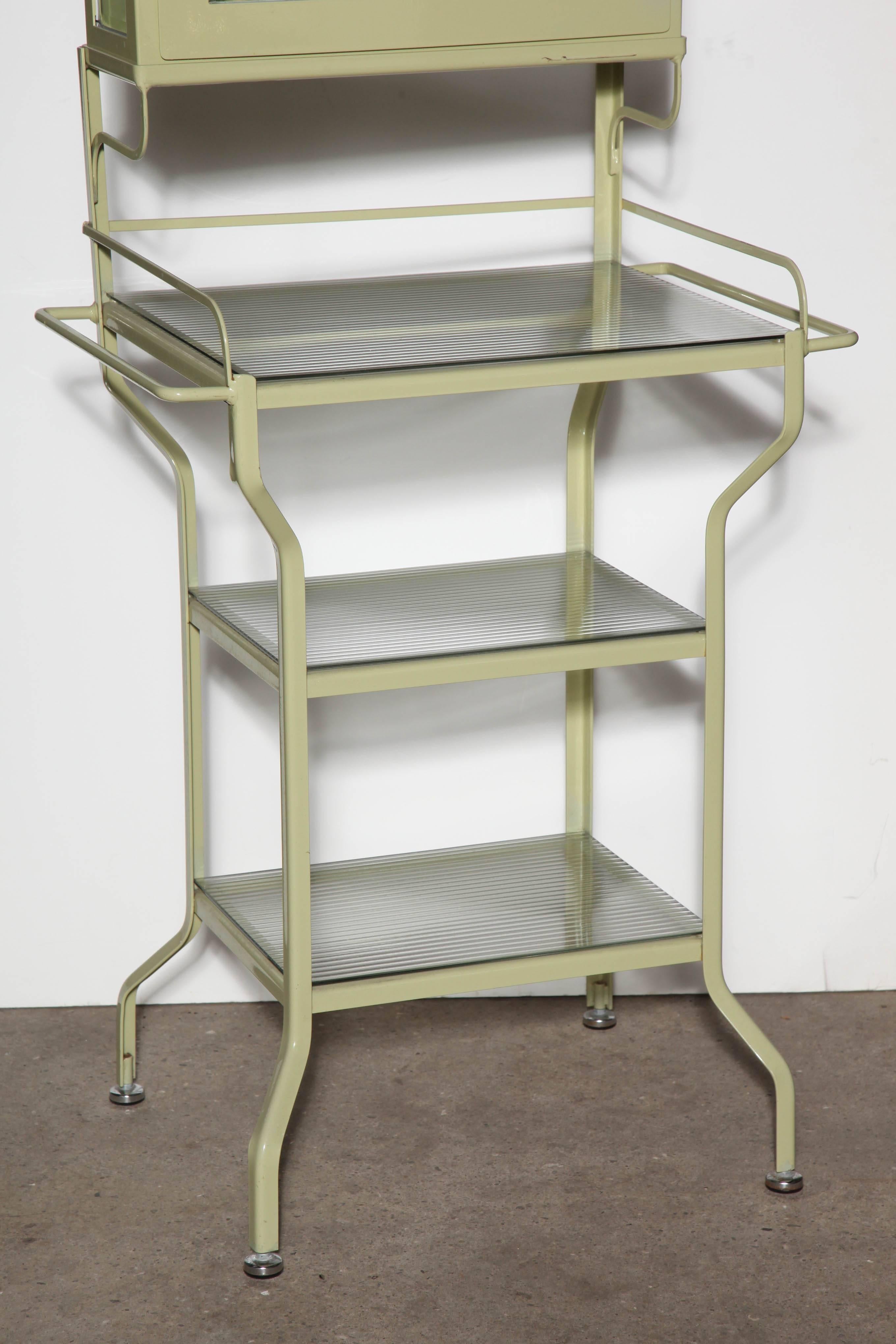 Early 20th Century Pale Green Enamel & Glass Storage Cabinet with Five Optical Glass Shelves, 1920s