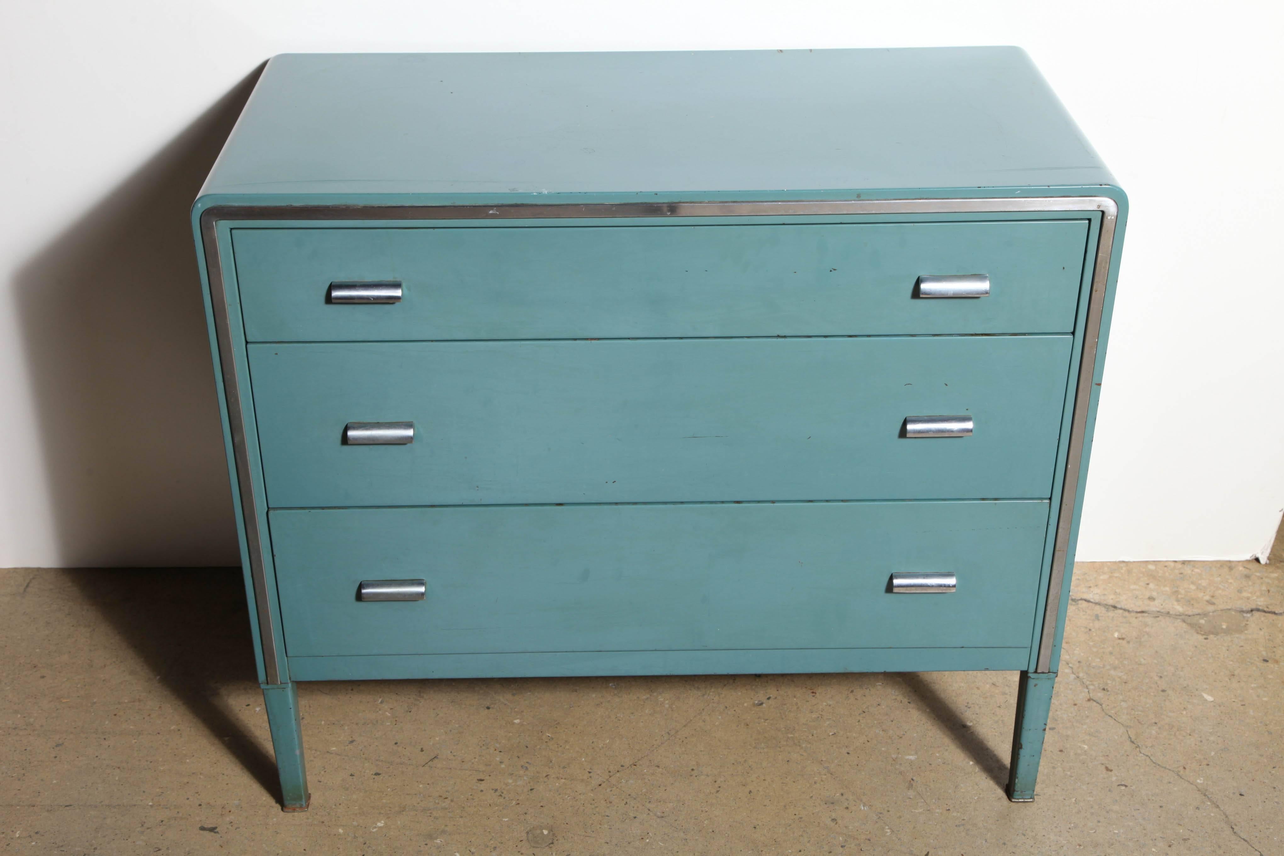 Art Deco Norman Bel Geddes for Simmons rare colored Teal, Aqua enameled Metal Dresser with 3 drawers, Chrome piping detail.  Polished Steel pulls.  Original condition