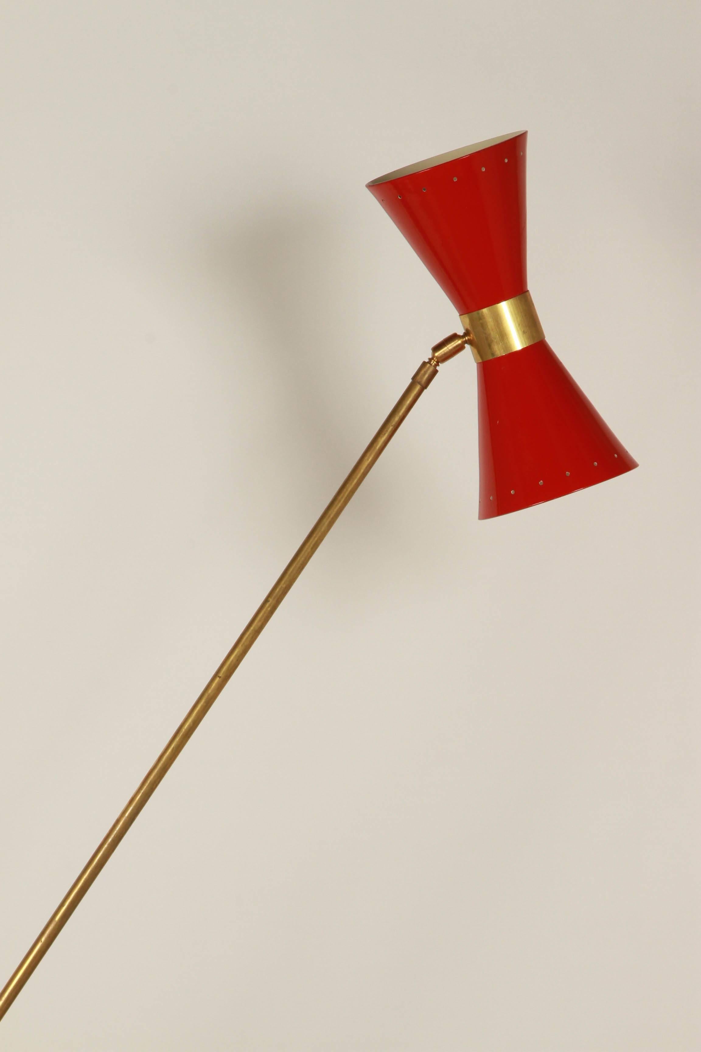 Perforated red enameled shade with heavy brass base and counterweight ball.