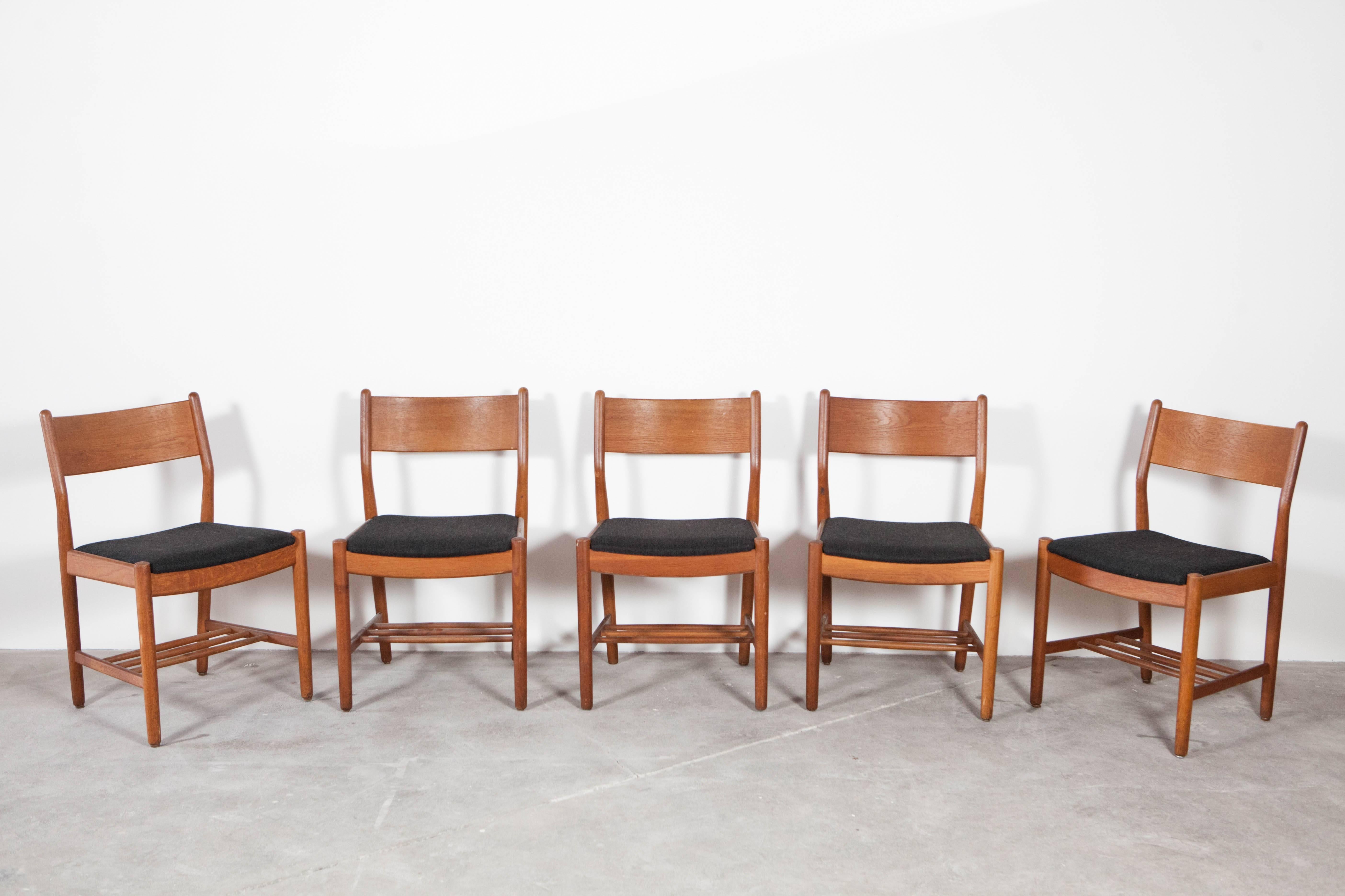 10 dining side chairs with black fabric by Borge Mogensen.