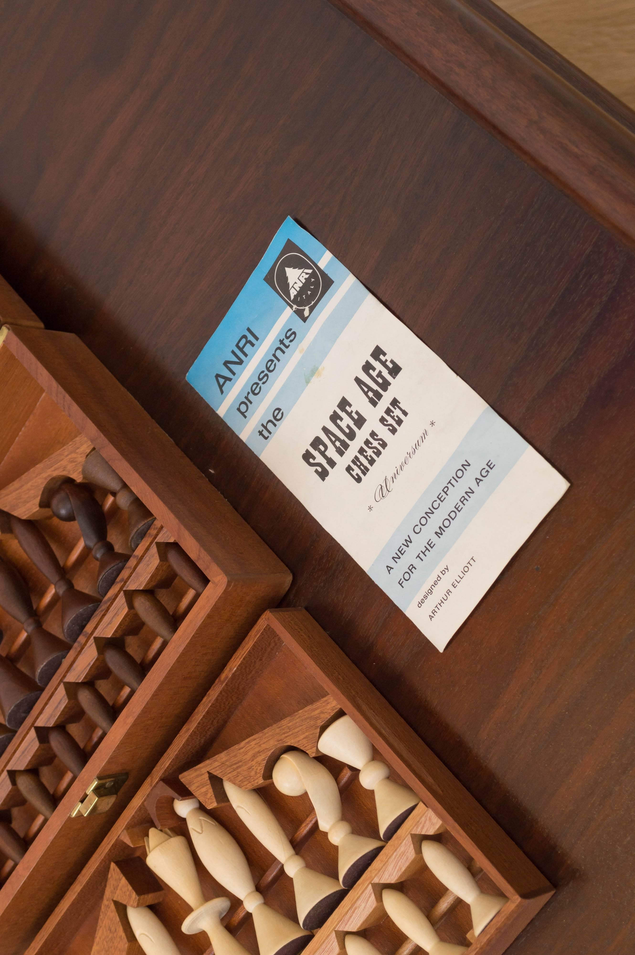 Hand-carved wood chess set designed by Arthur Elliot for ANRI, with original box.