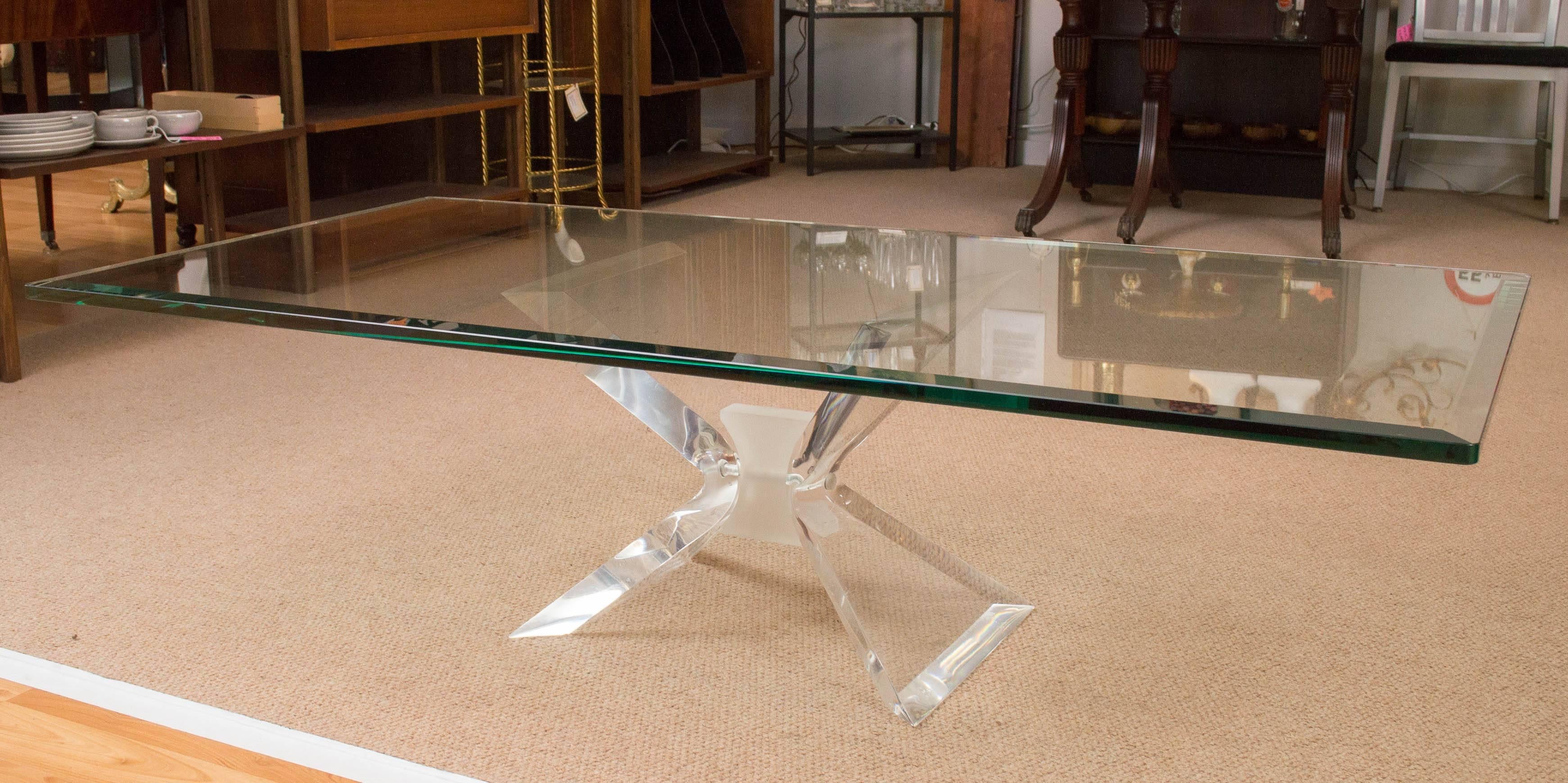 Large 1970s Lucite Butterfly shaped base coffee table, with it's original heavy and large beveled glass top. Glass is 3/4's of an inch thick. 