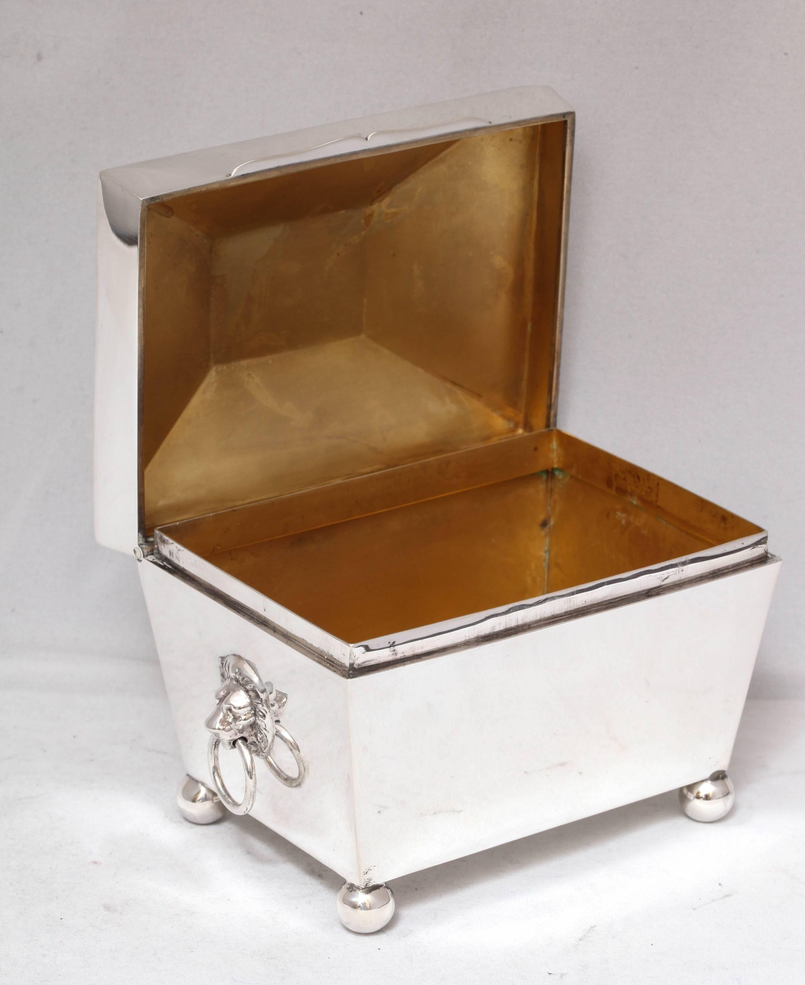 Edwardian, rare and unusual sterling silver table box with hinged lid, ball feet and 
