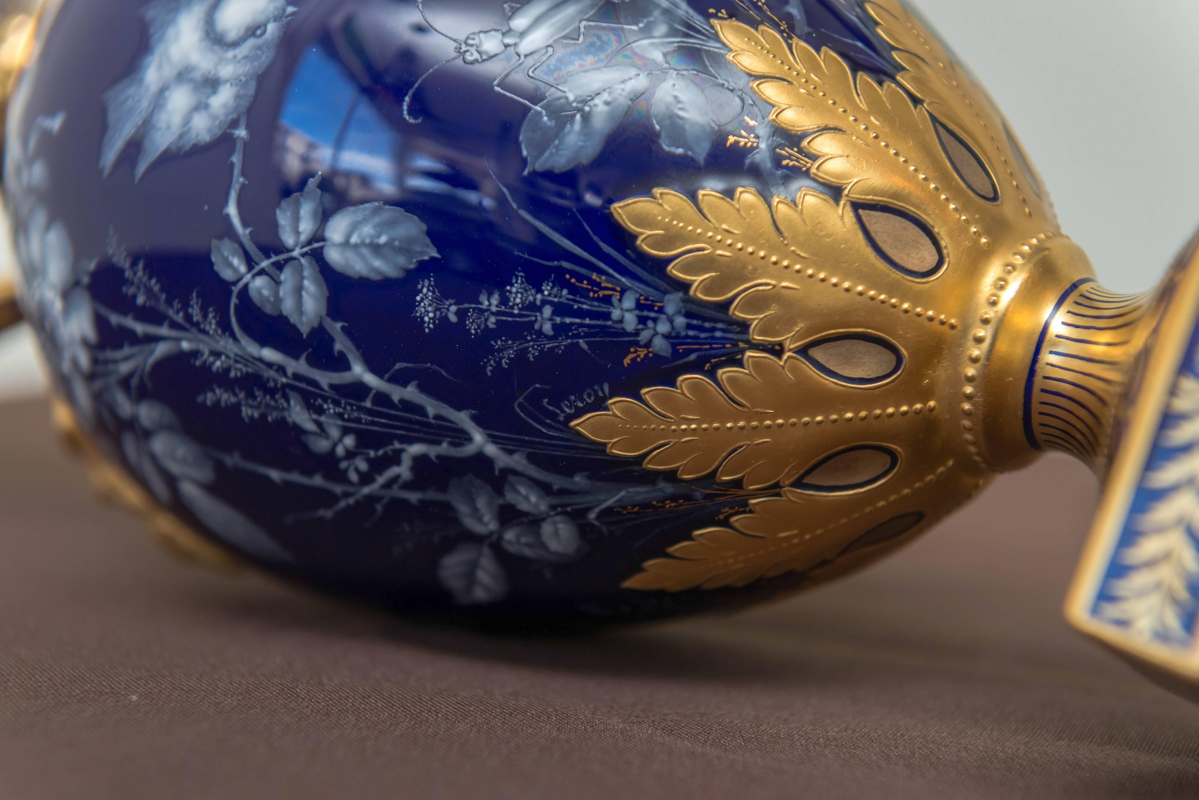 Gilt Pair of Royal Crown Derby Porcelain Cobalt-Blue Ground Ewers, circa 1893