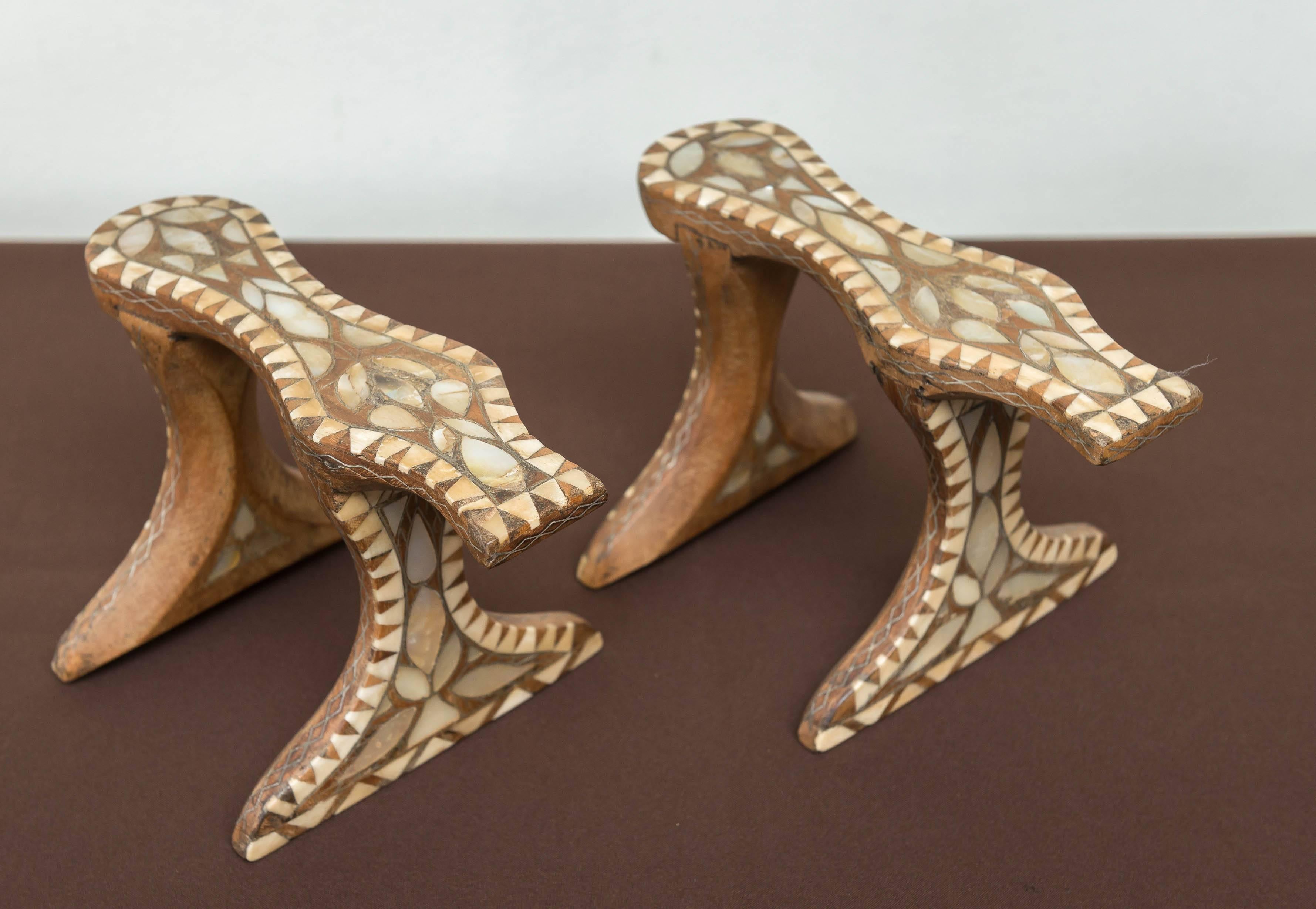 Pair of exotic late 19th c. / early 20th c. Turkish bath shoes. Hand carved rosewood with an interesting elevated platform last. inlaid with bone, mother-of-pearl and pewter. Circa 1890 -1910.