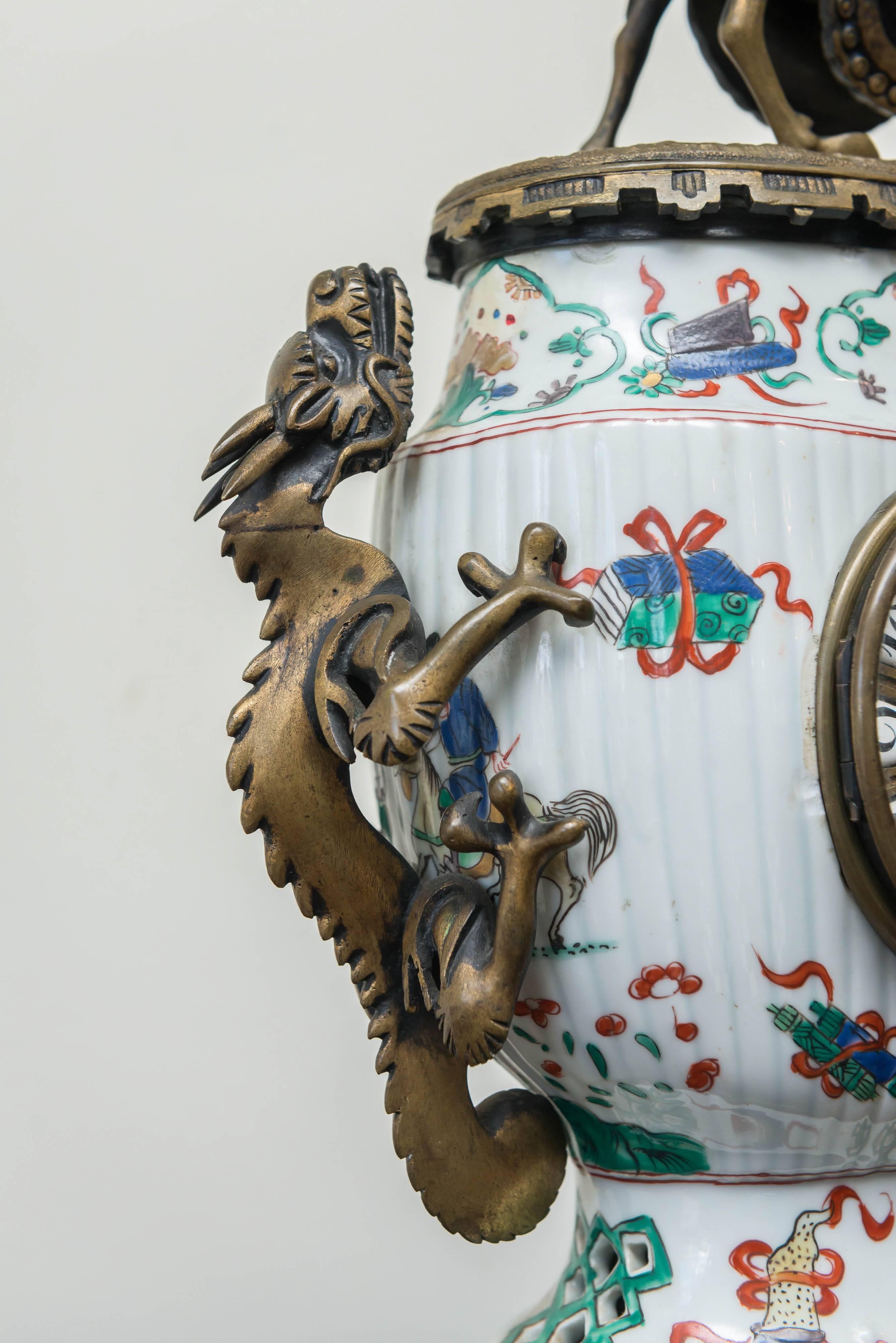 Cast 19th Century, French Clock in the Chinoiserie Style For Sale