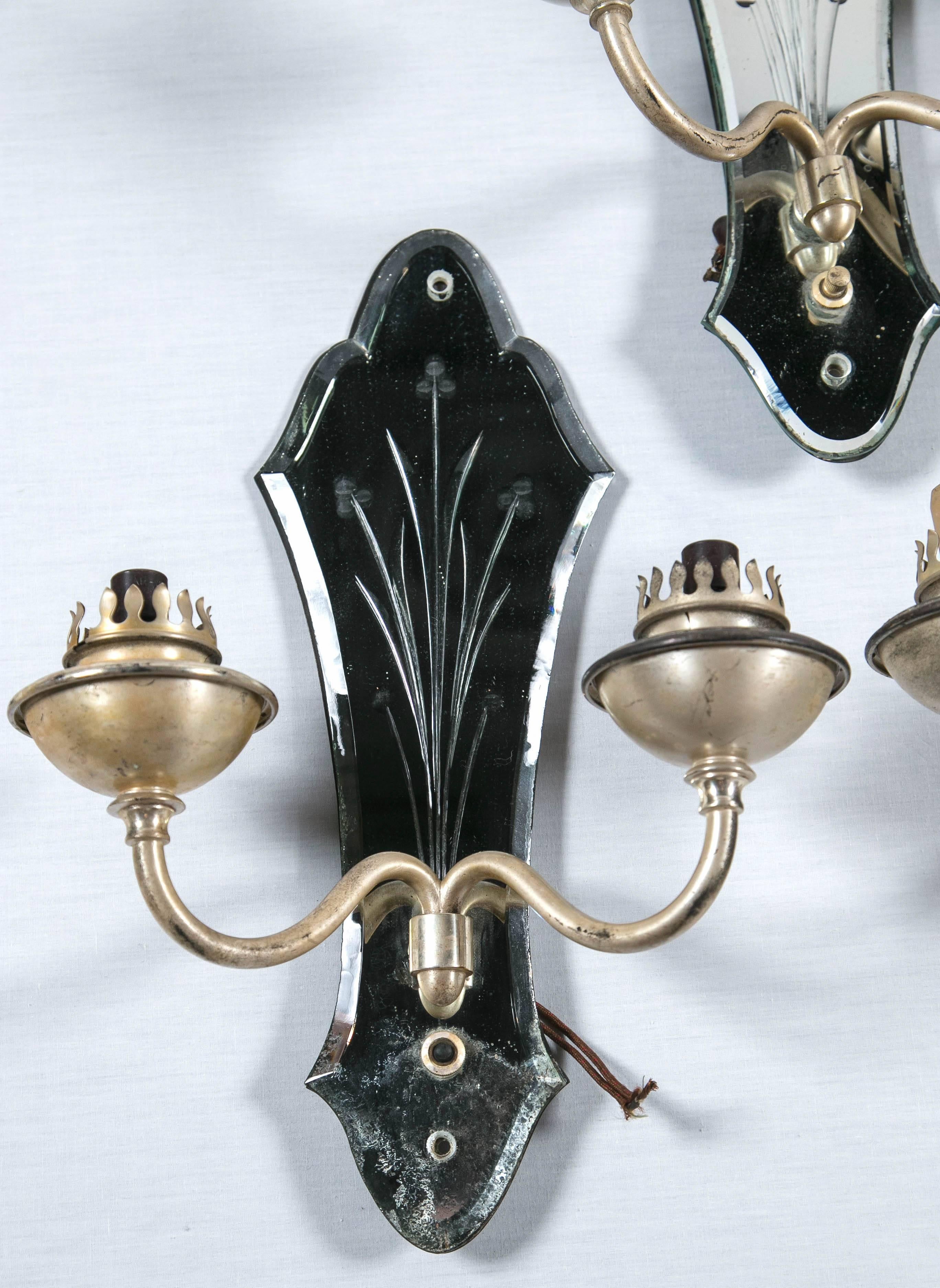 Great set of four pair of French mirrored sconces with etched floral motif.