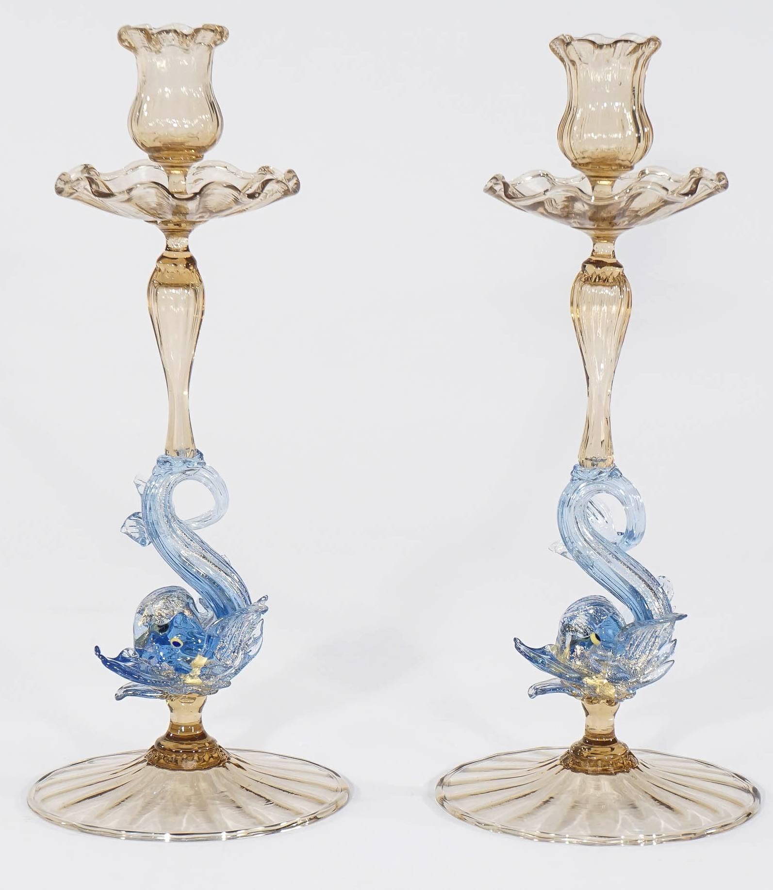 This is a whimsical and beautifully articulated pair of handblown candlesticks made by Salviati, circa 1920s. The combination of Topaz and French Blue works well with many palettes and also provides a lovely display or addition to a collection. The