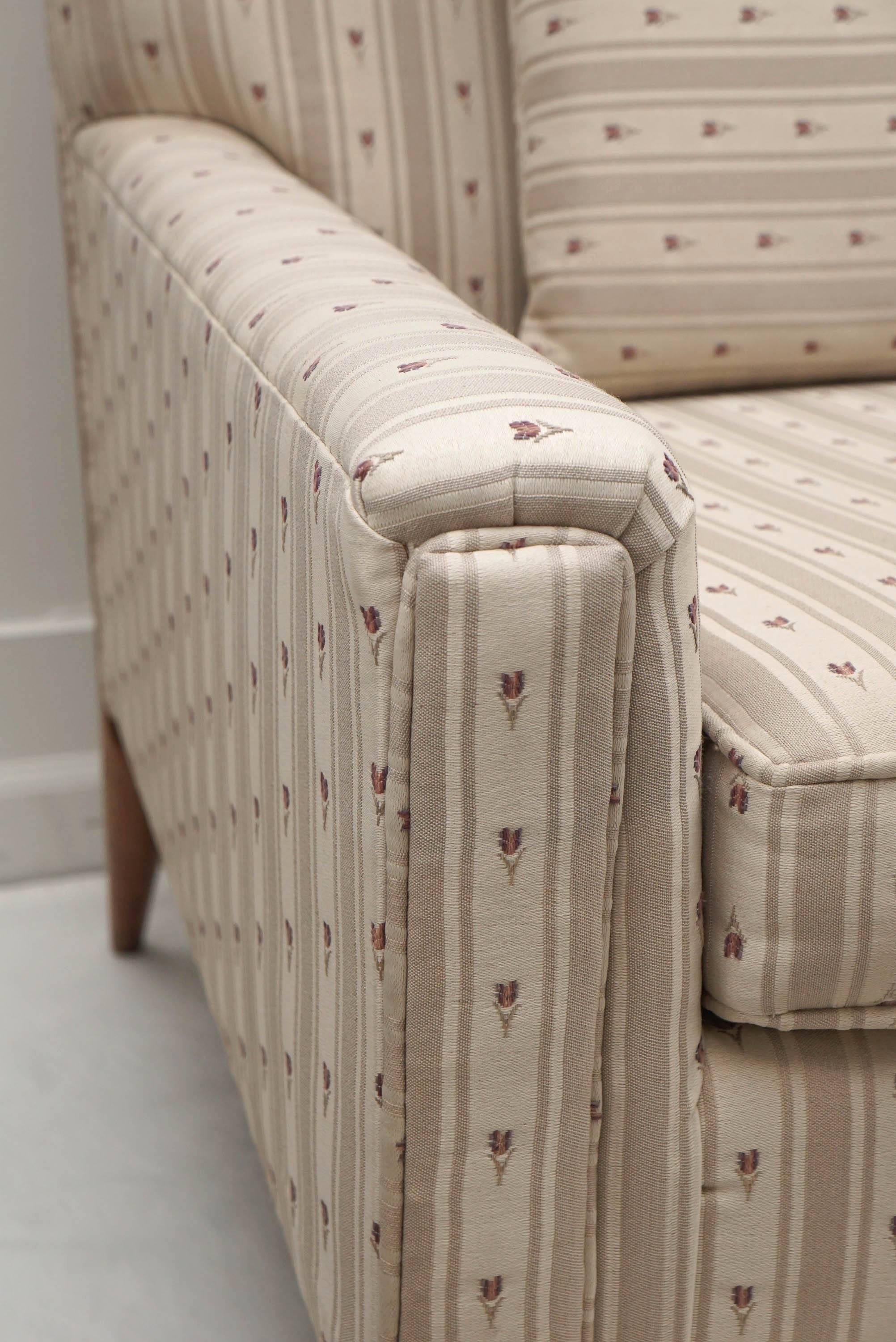sofa with wood trim