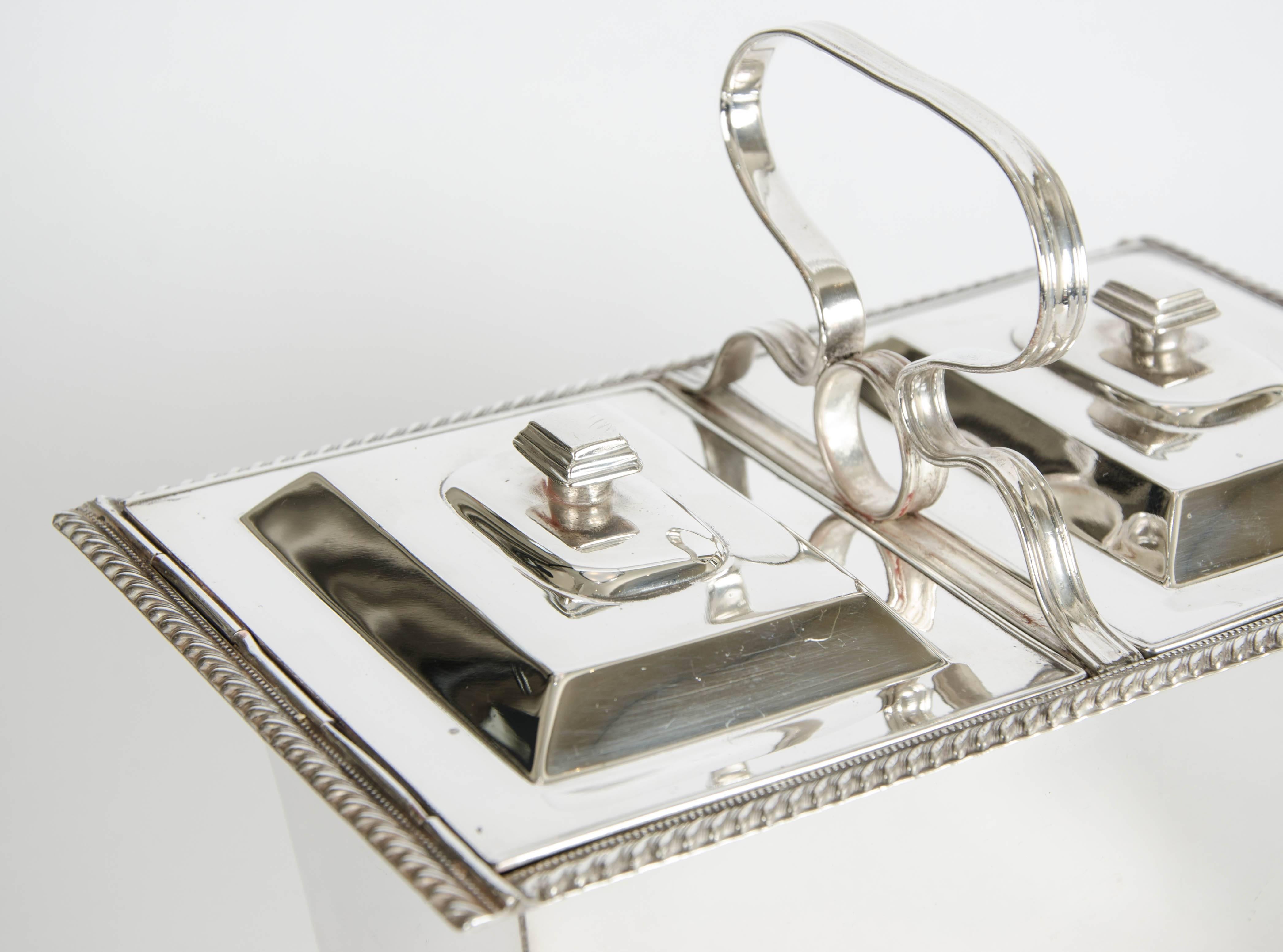 Silver plate double tea caddy, Circa 1940. 
An unusual piece, this double caddy is perfect not just for tea, but to store a whole host of items. 
Will also look stunning as a table centrepiece.

Please contact us for shipping prices.