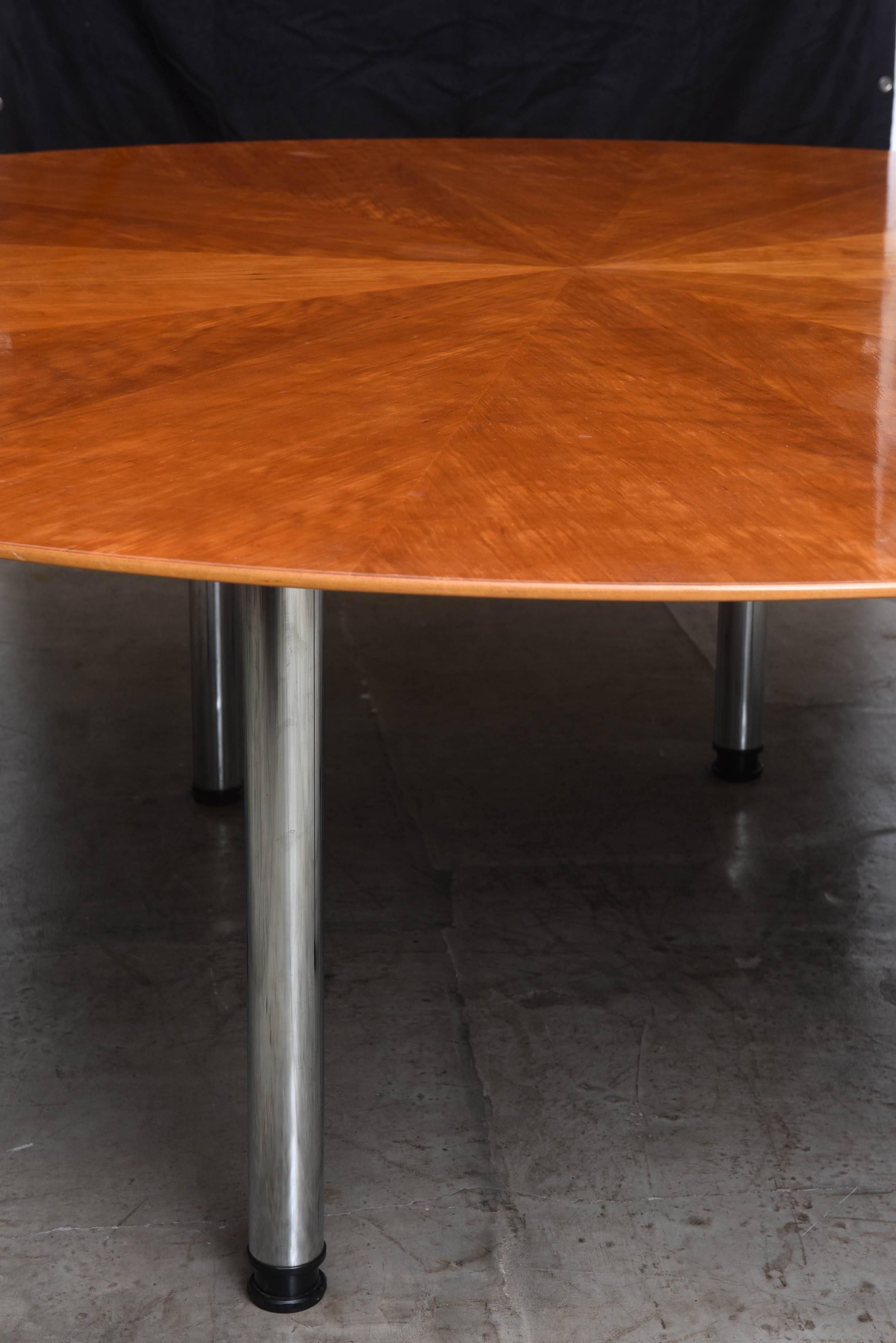 Klaus Wettergren: Circular dining table with six legs of chromed steel with self-leveling bottoms. Top of cherrywood. Table is in beautiful original condition with some marks of age.
Swedish designer Klaus Wettergren, b. 1946.
Table circa