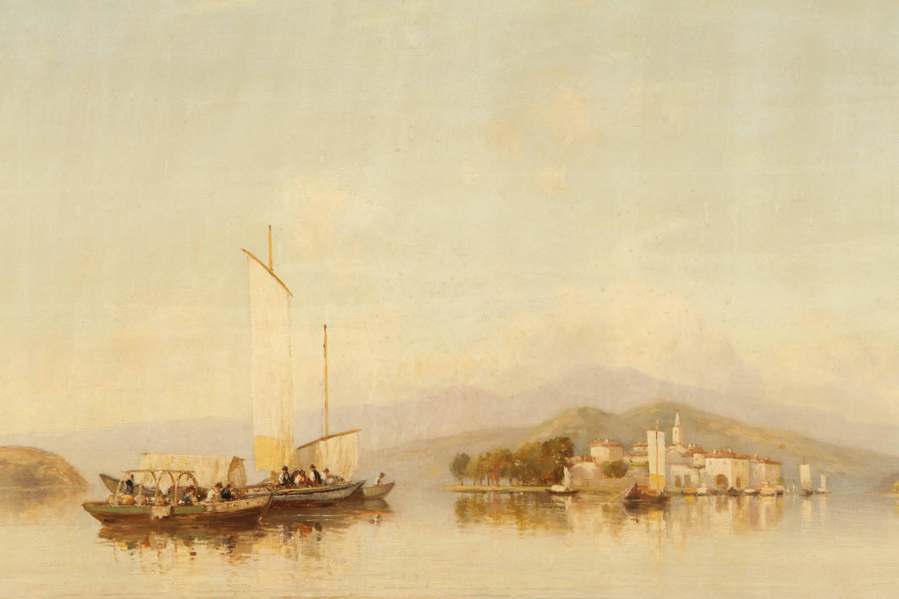 John Varley (1778-1842, English) LAGO MAGGIORE The painting depicts ships in a bay, in a tranquil setting of barges with sails floating on the water next to a town with trees, with mountains in the distance.