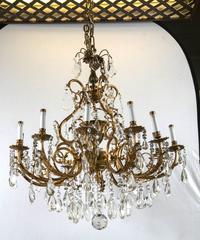 Bronze and Crystal Twelve-Light Continental Chandelier