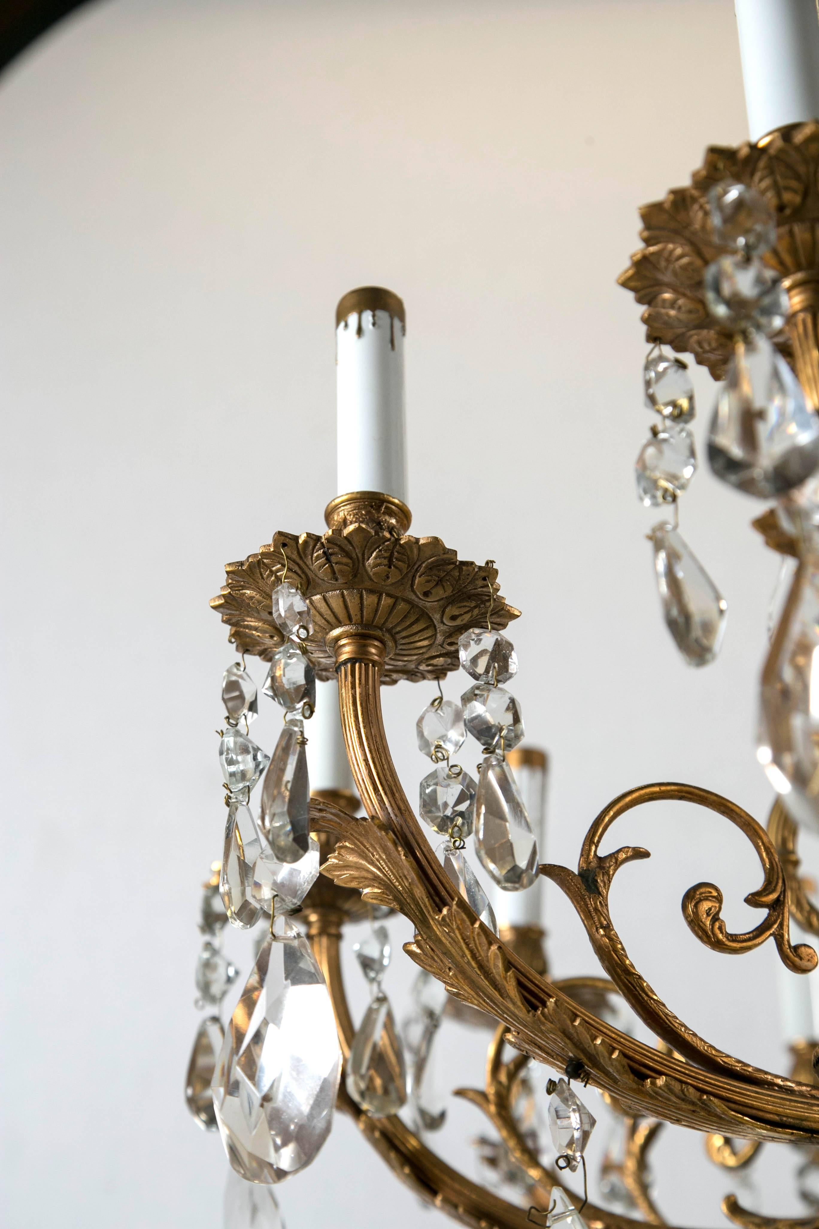 European Bronze and Crystal Twelve-Light Continental Chandelier For Sale