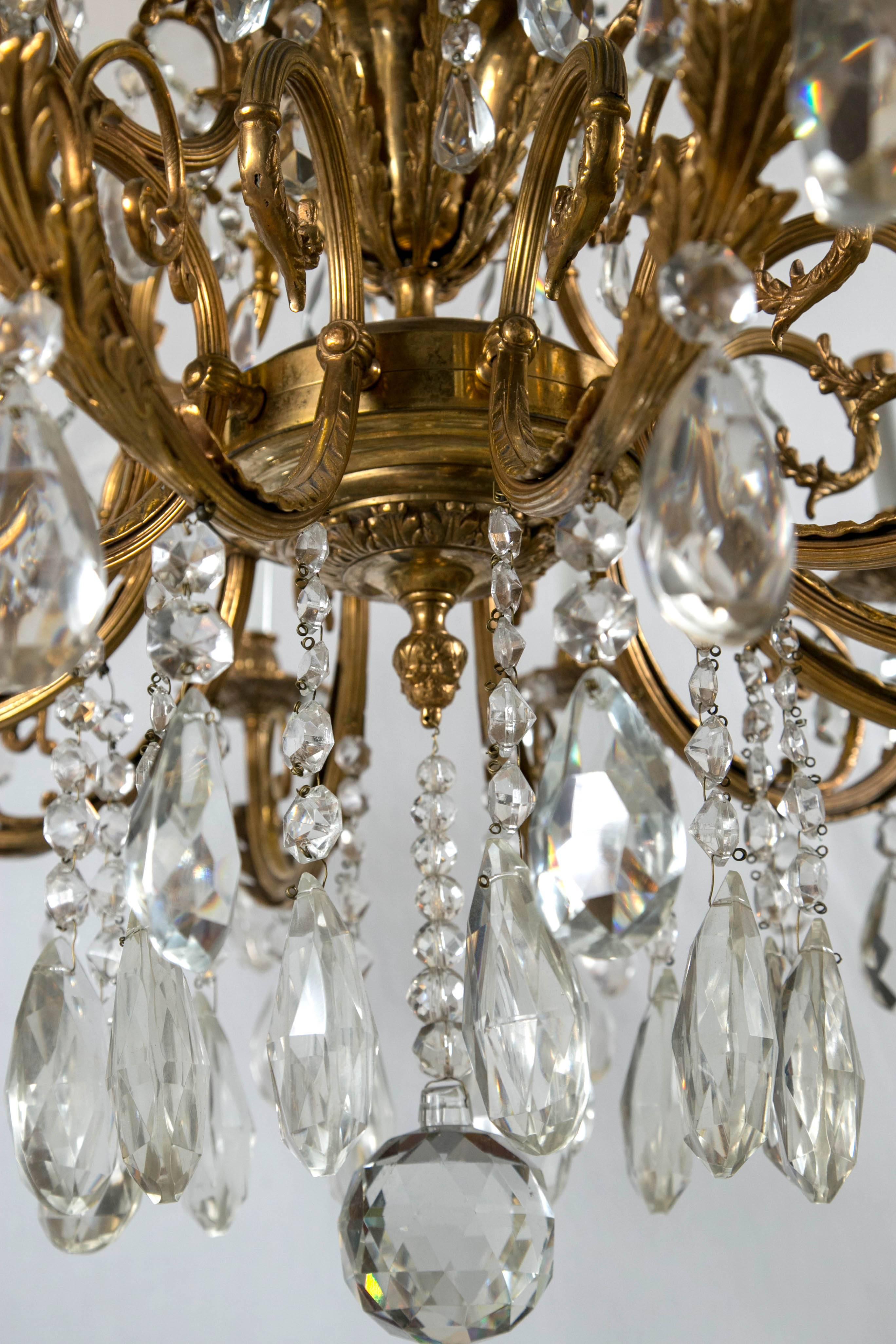 Bronze and Crystal Twelve-Light Continental Chandelier In Excellent Condition For Sale In Woodbury, CT