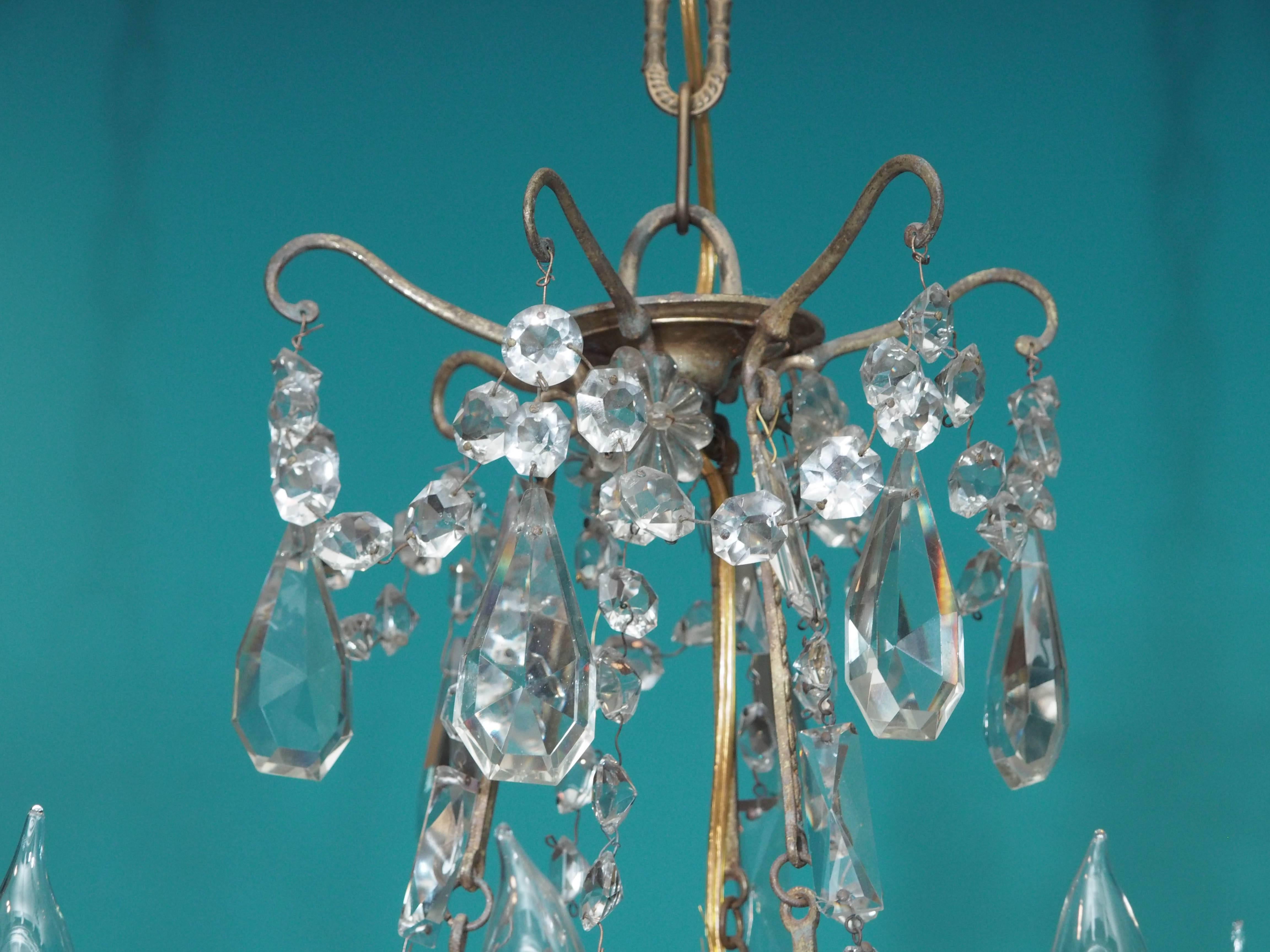 Small-scale early 19th century French Charles X period crystal chandelier with nine lights.