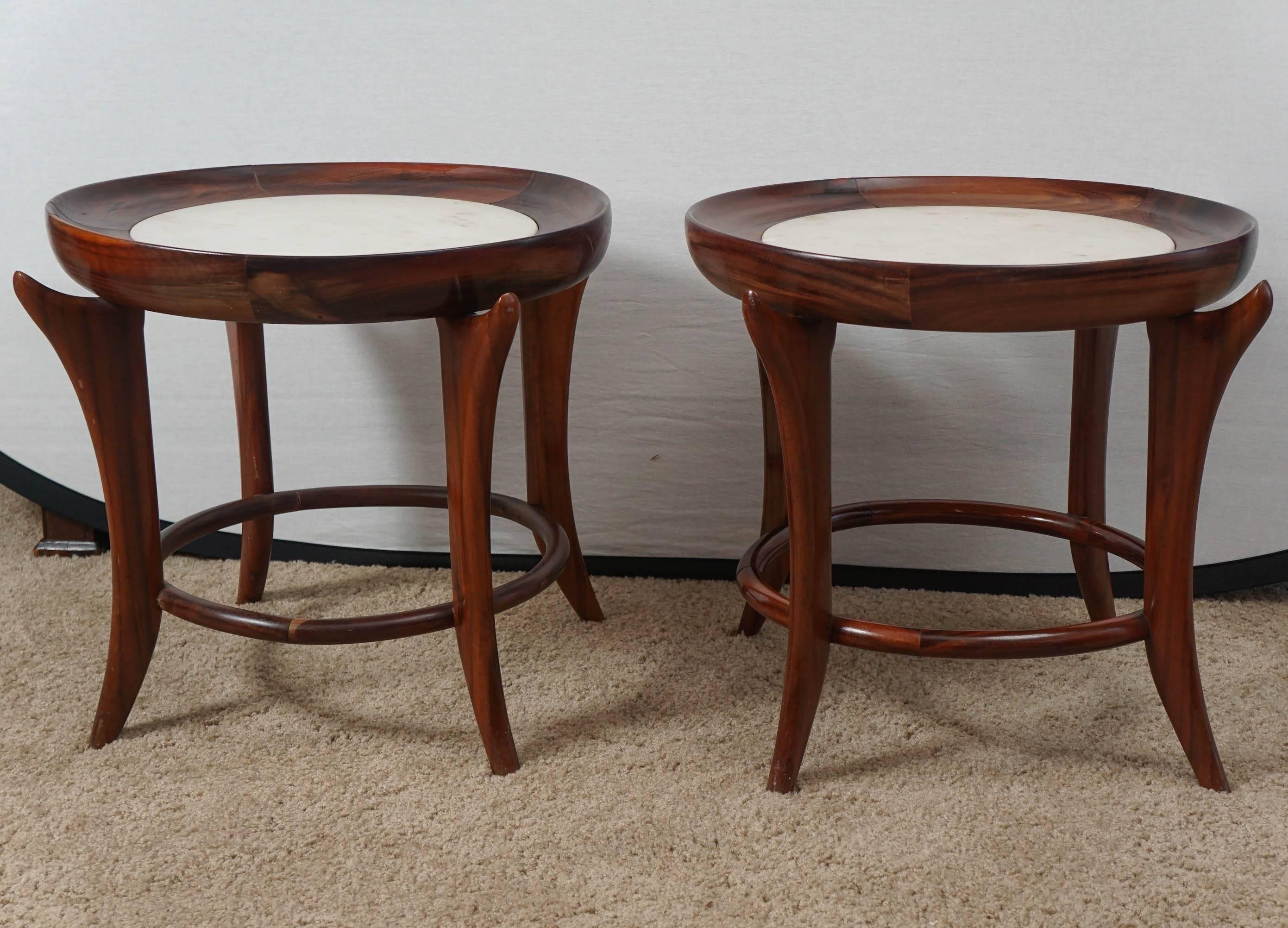 Stunning pair of rosewood and marble side or end tables. Curvy form and wonderful grain create an elegant and airy statement, circa 1960s.
