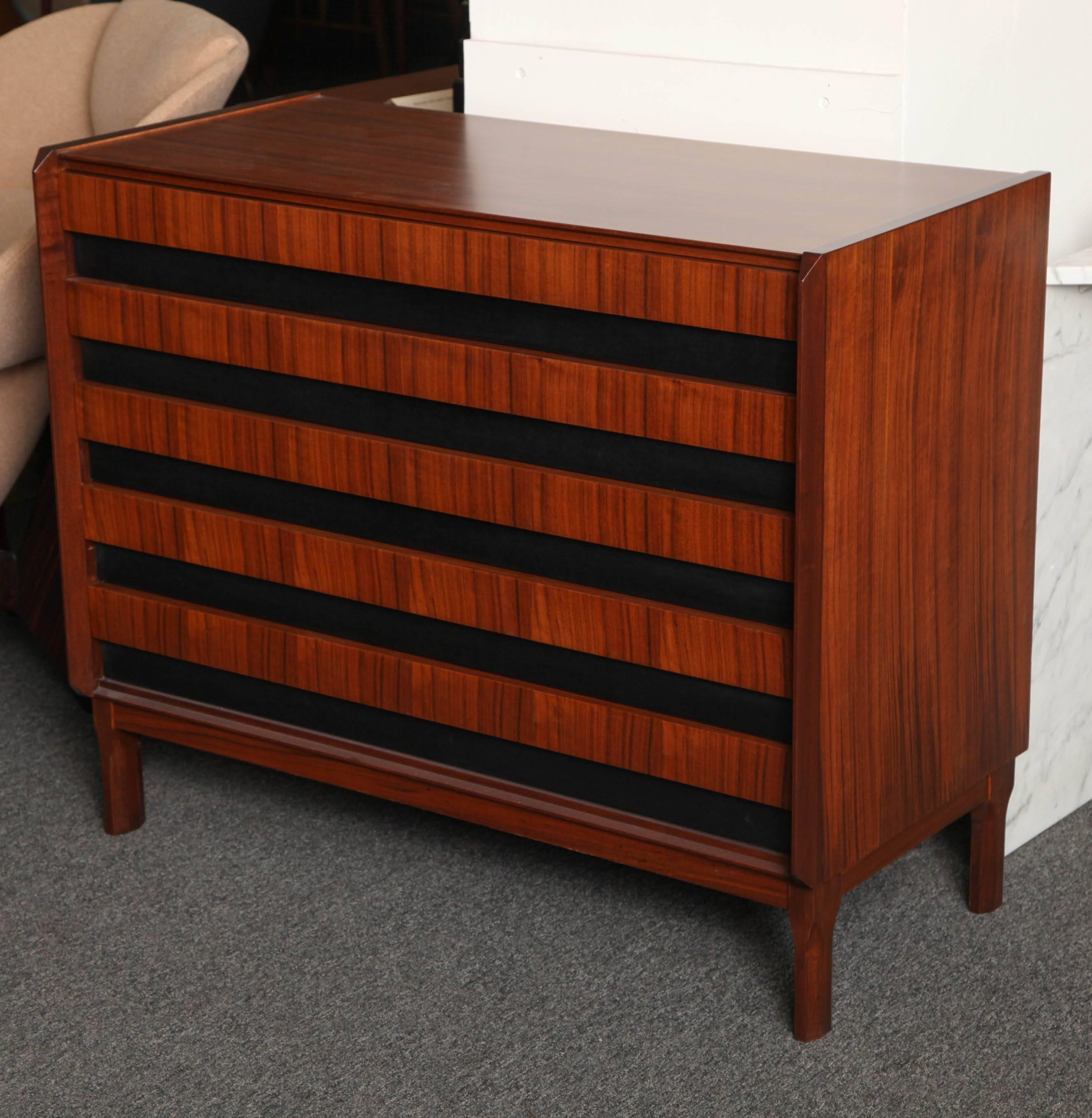 Beautiful five-drawer rosewood dresser designed by Dassi made in Milan, 1955, nice ebonized detailing on drawers, great quality and size.