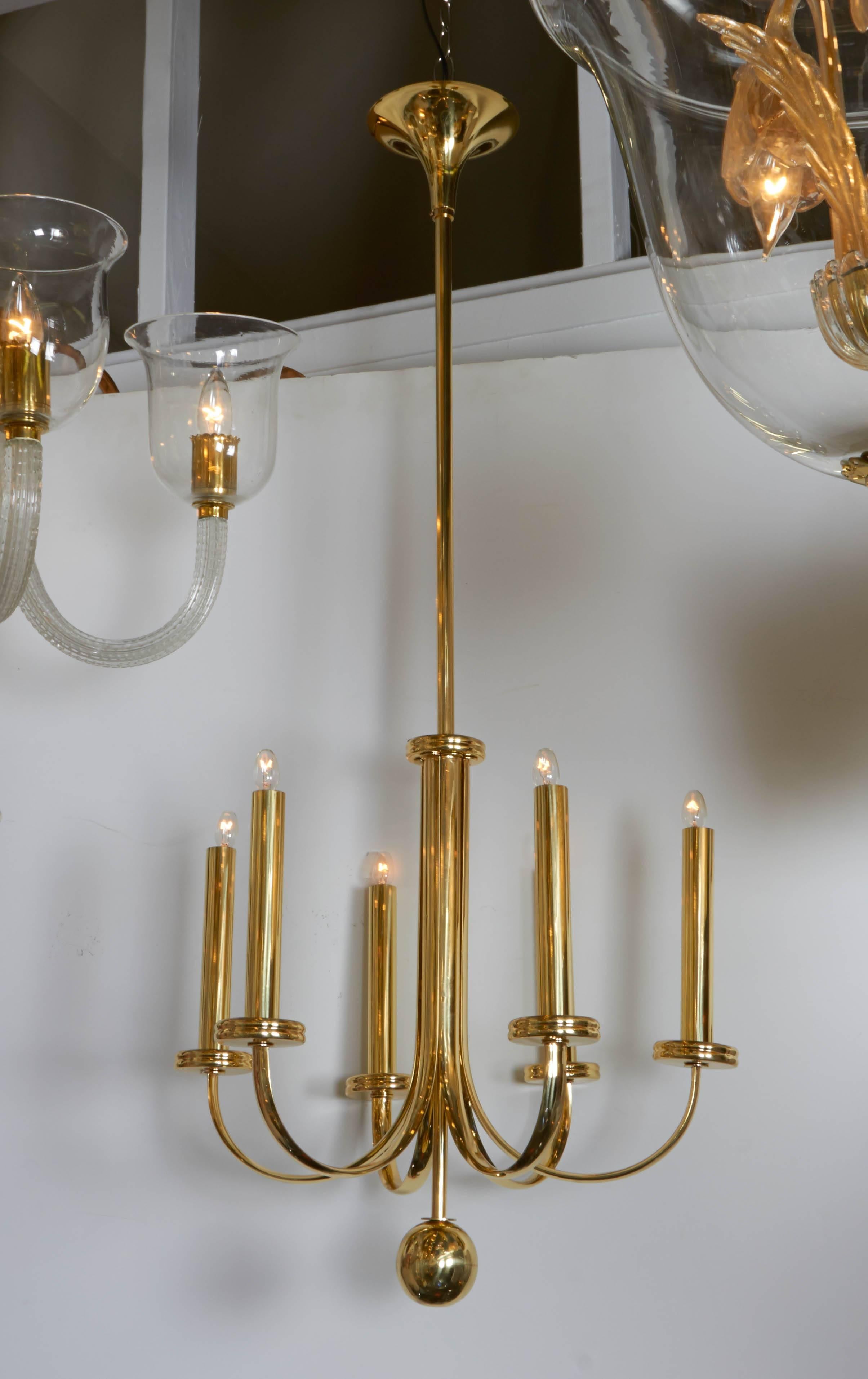 A wonderful example of Italian 1930s Art Deco and Fascist period lighting in an elegant and clean design. Six arms and all brass newly polished and lacquered. Rewired. Diameter of chandelier 20