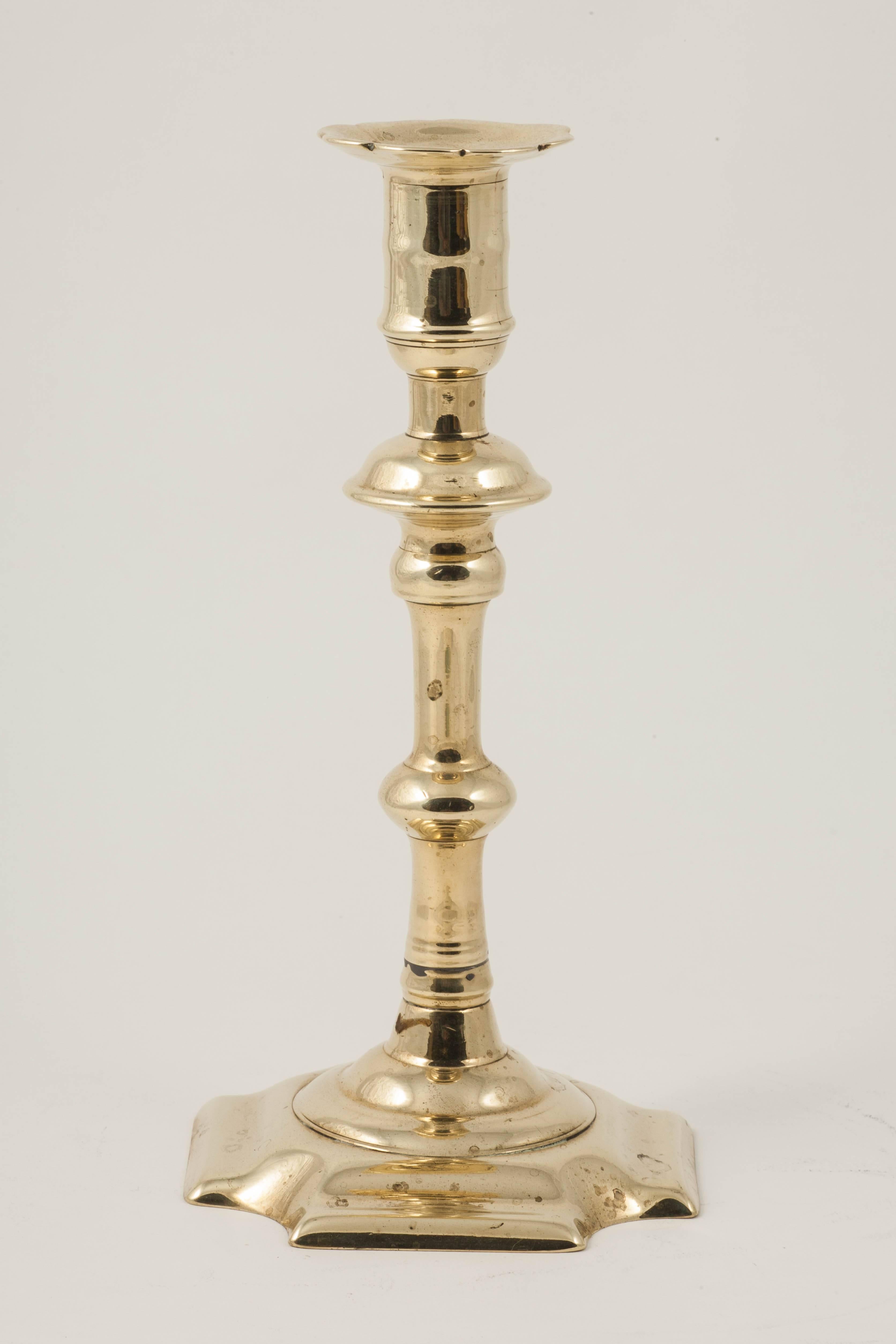 England, circa 1750.
Georgian brass candlesticks in general are far more rare than those of the same date in silver. Because silver was always valued, it was treasured and kept safe, and over the years has managed to survive. Brass was generally