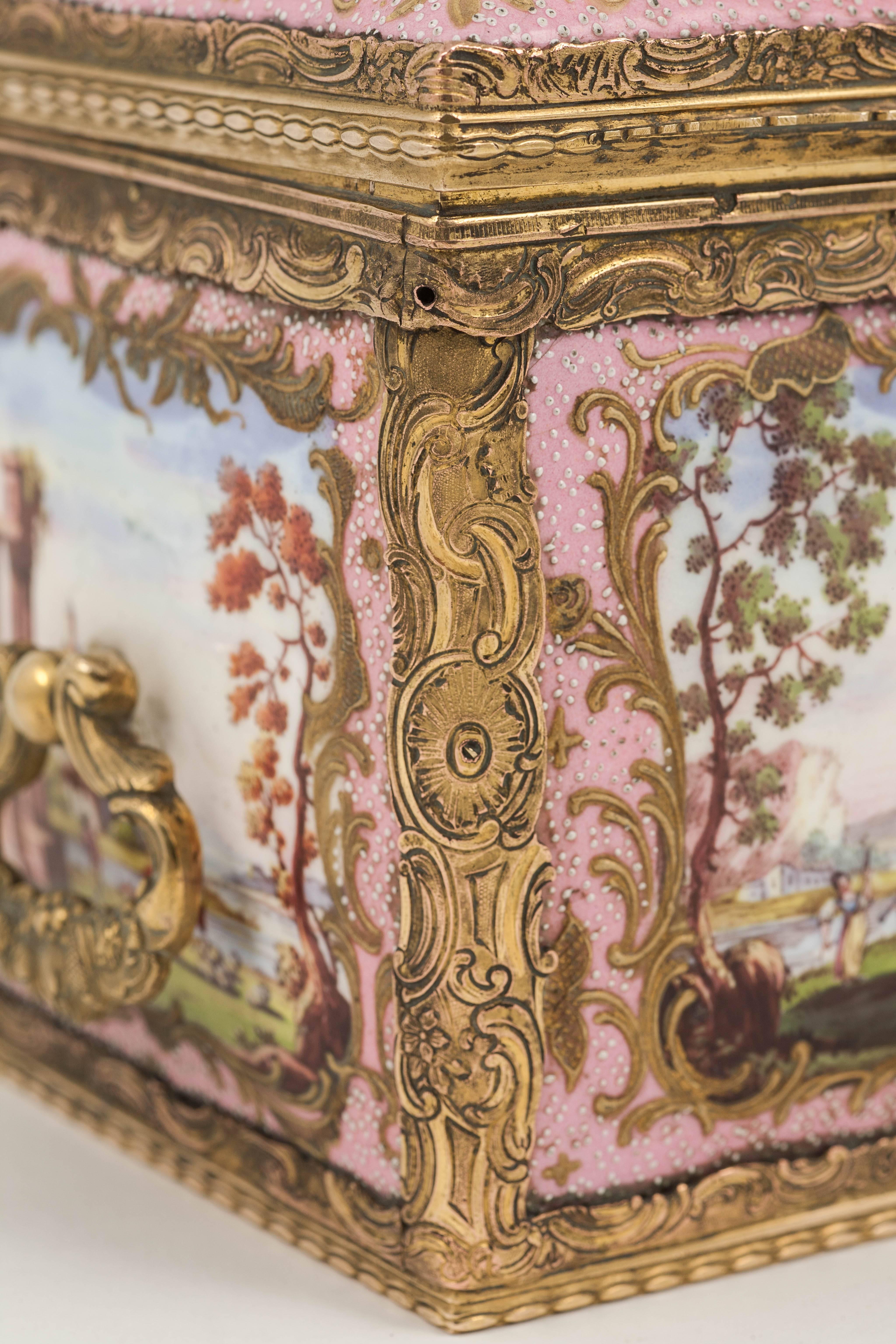 Beautifully decorated with classical landscapes, within gilded scrollwork, against a pale pink background. 

A similar example may be seen at the Victoria and Albert Museum, London.

This fine hand-painted casket is not only a rare survival, but