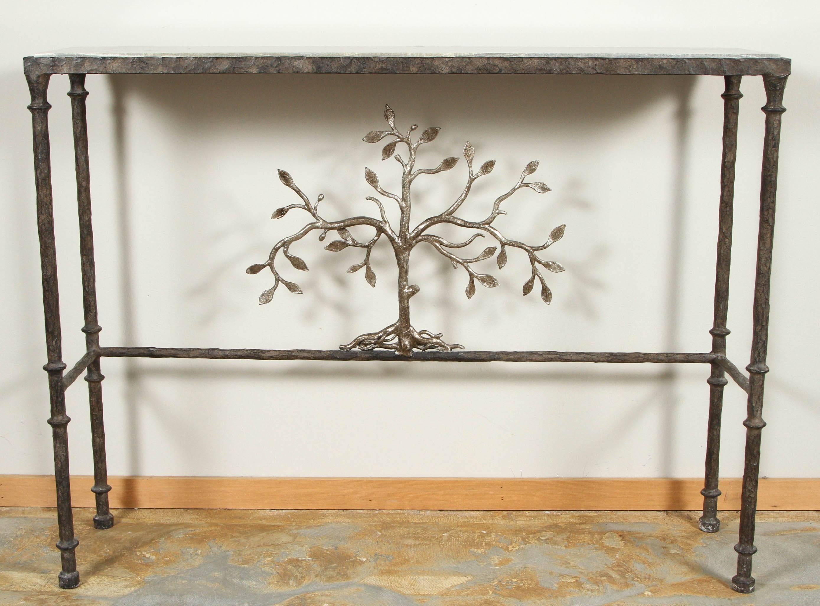Hand-hammered iron console table after Diego Giacometti, with silver limestone top, the tree is genuine silver over iron.