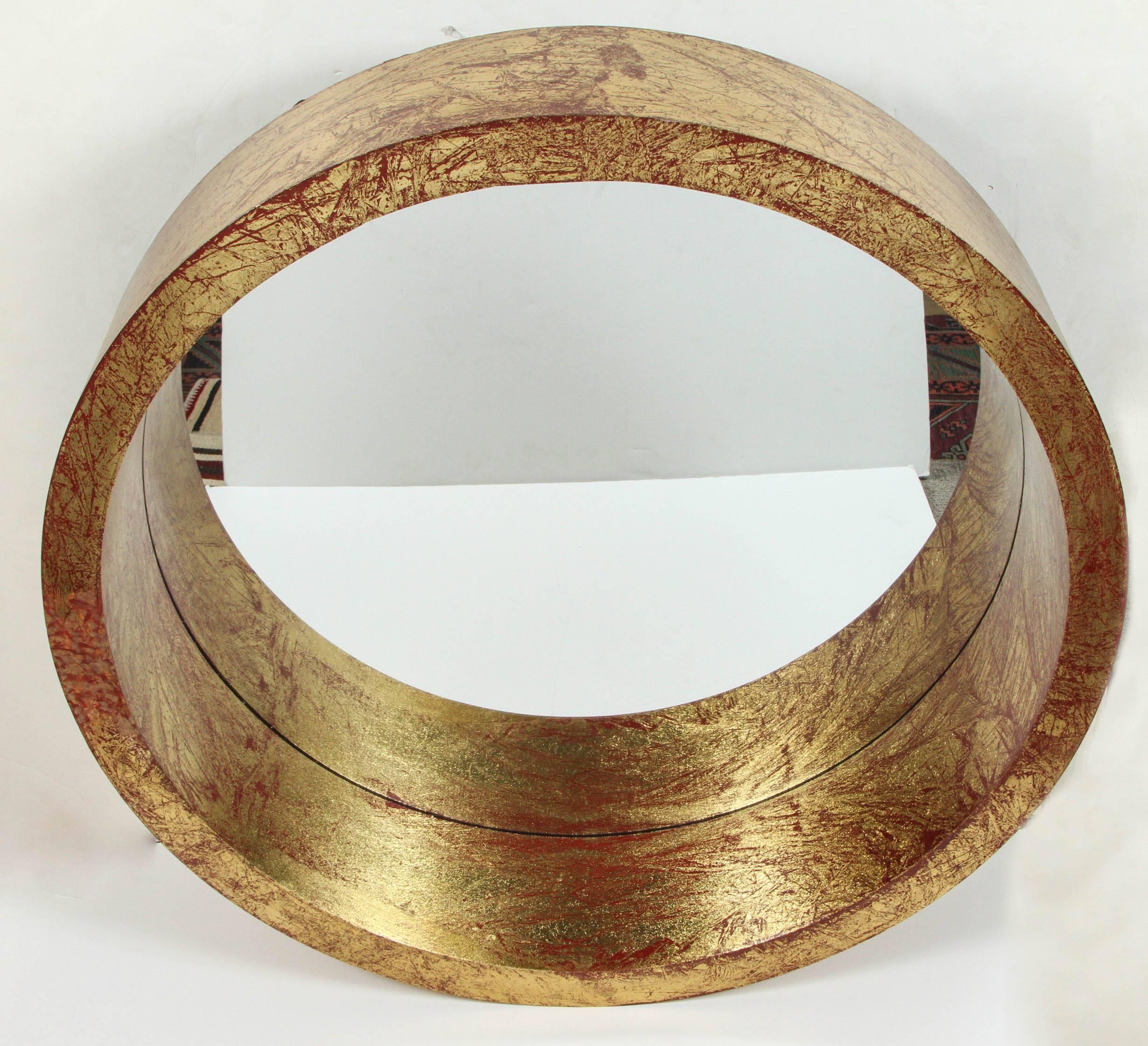 Mid-Century Modern wood portal mirror with faux gold leaf finish with red undertones.